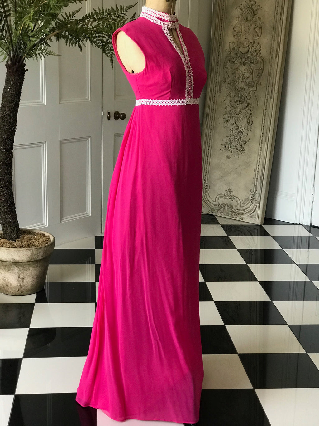 Vintage 1970s Sleeveless hot pink chiffon maxi dress with pearl buttons