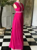 Vintage 1970s Sleeveless hot pink chiffon maxi dress with pearl buttons