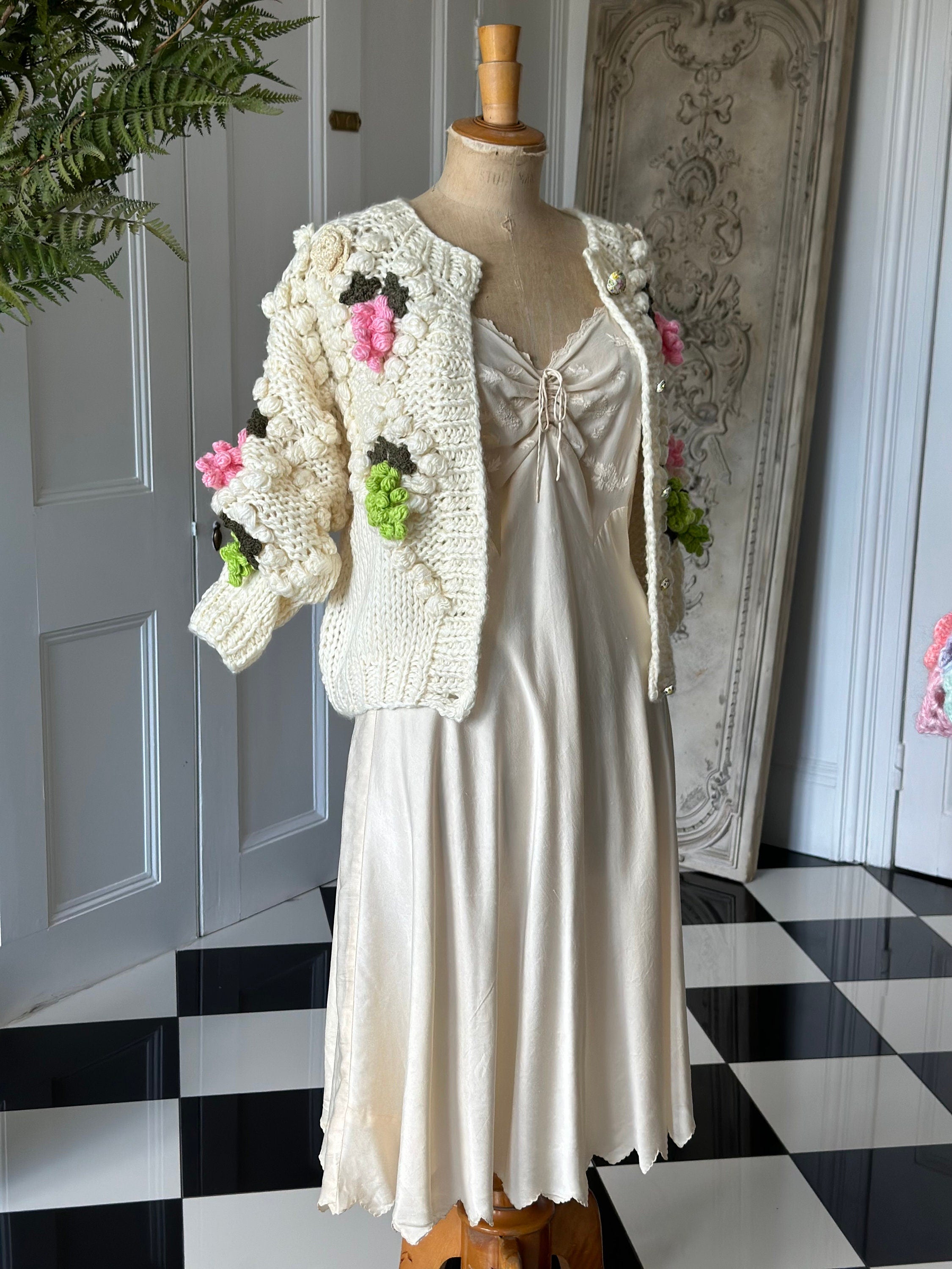 Vintage style hand knitted cream cardigan with grape details