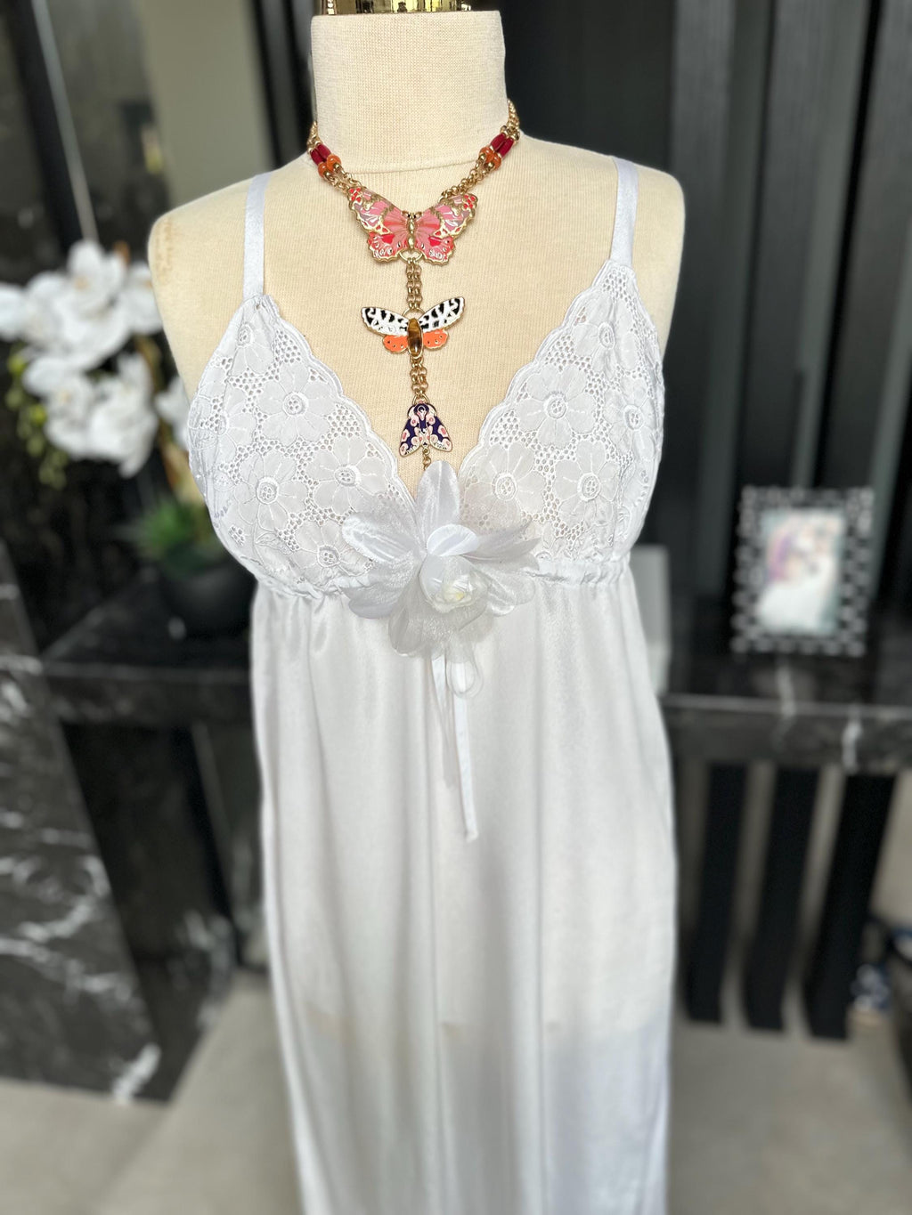 1970s white long satin slip dress with embroidery to the front.