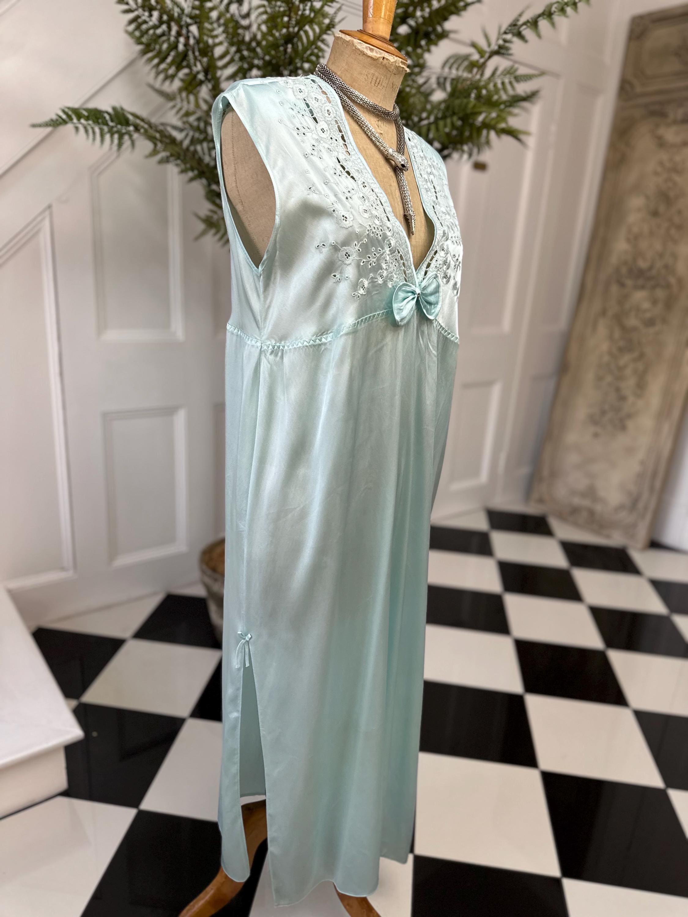 1980s seafoam green long dress with embroidery and plunge neckline