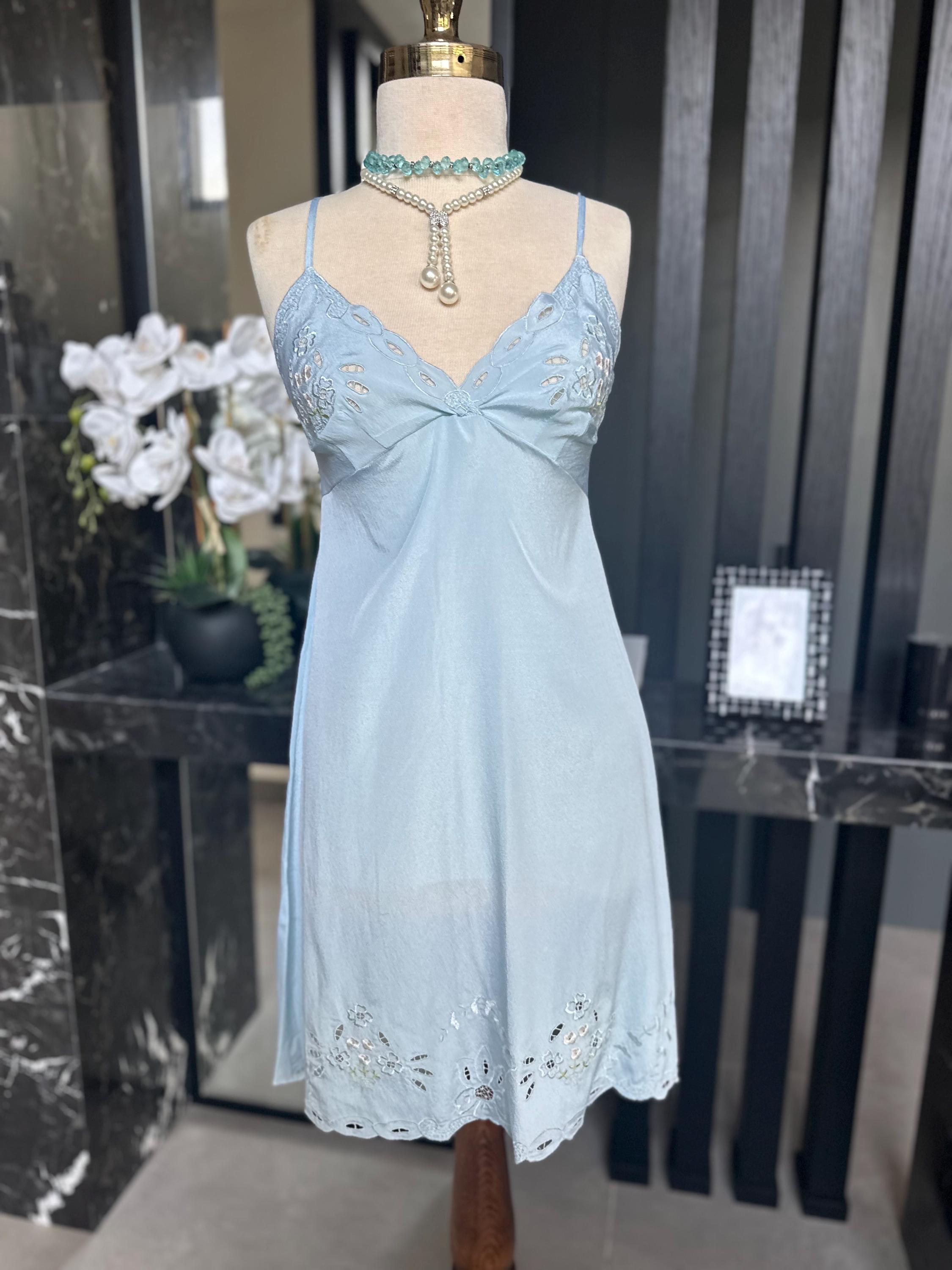 1970s baby blue short satin slip dress with embroidery to the front.