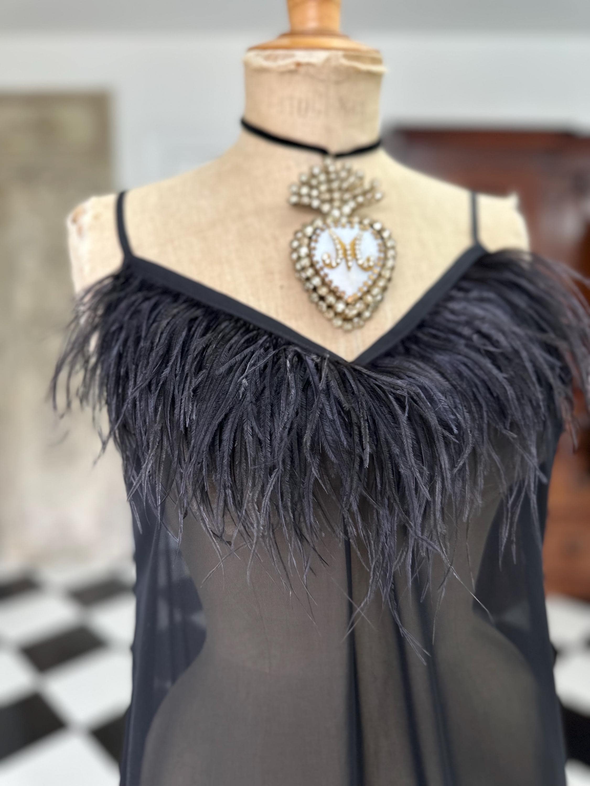 Vintage inspired black sheet chiffon high low slip dress with ostrich feather