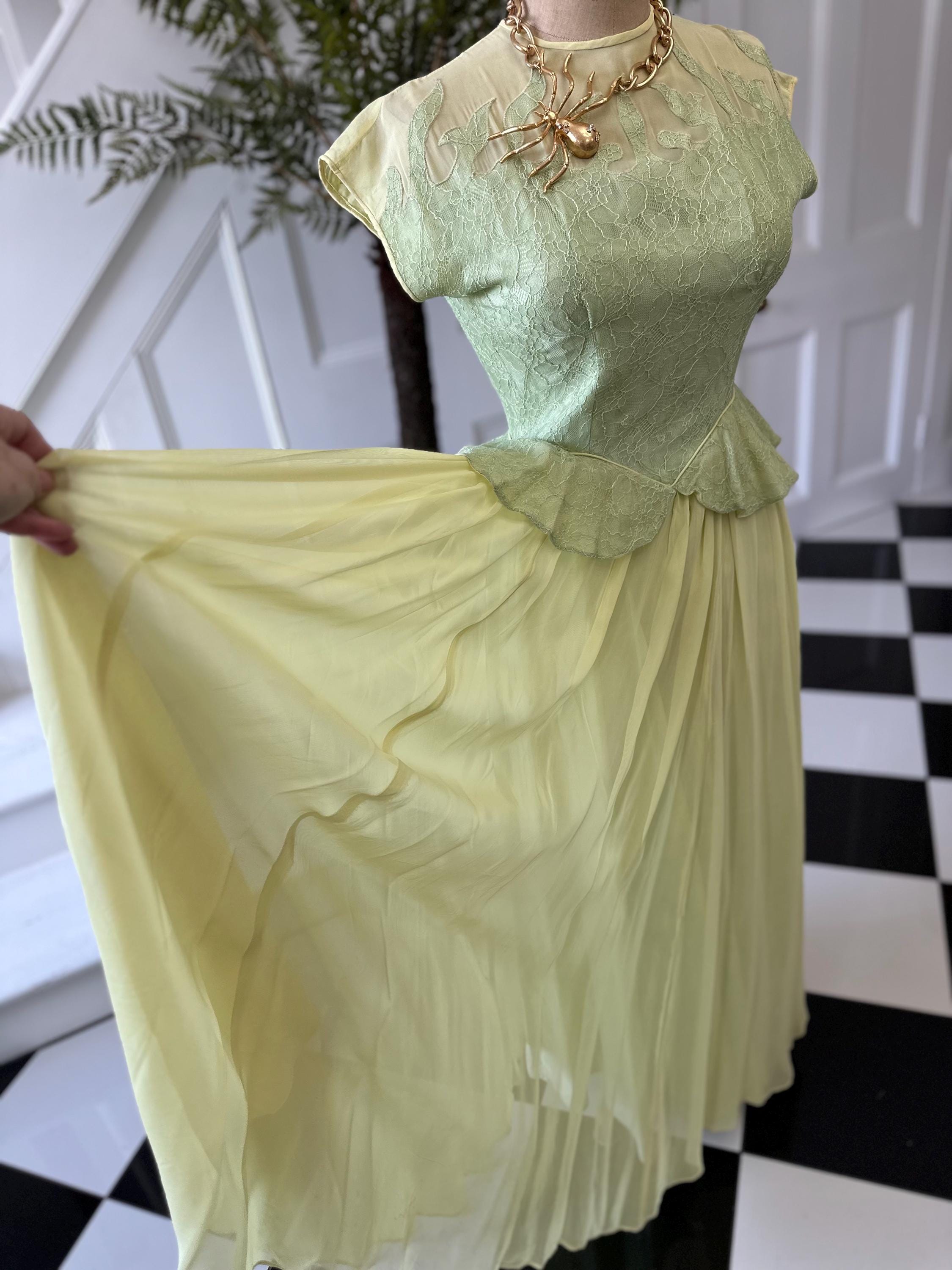 True 1940s Show Stopper Peplum Dress in chiffon and lace