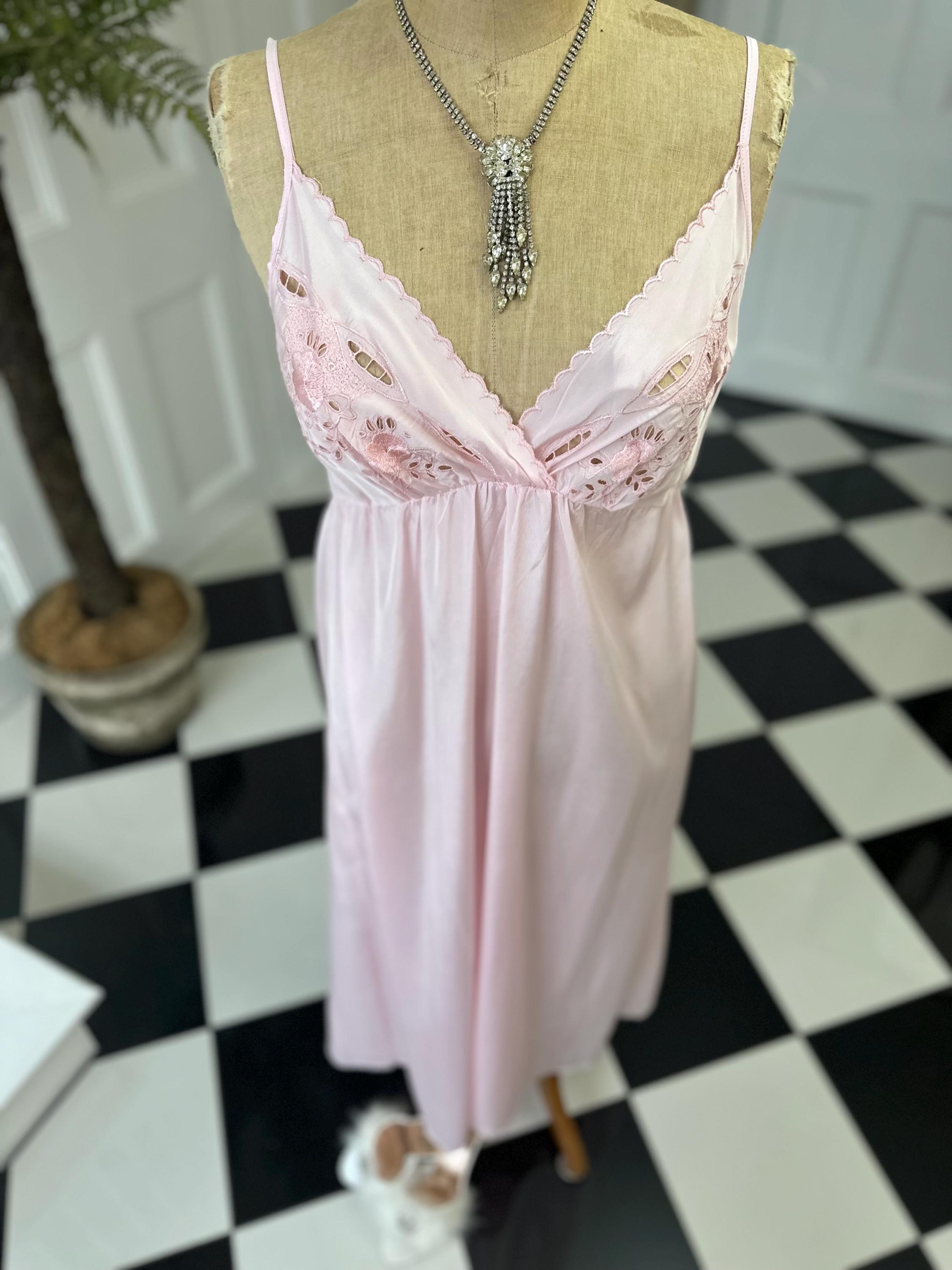 1970s long slip dress in baby pink with embroidery to the front.