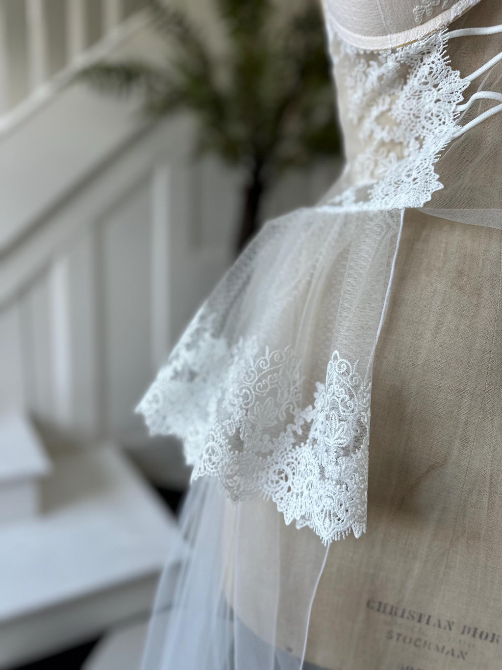 The Seraphina corded lace bridal bustier gown with scolloped peplum and tiered tulle