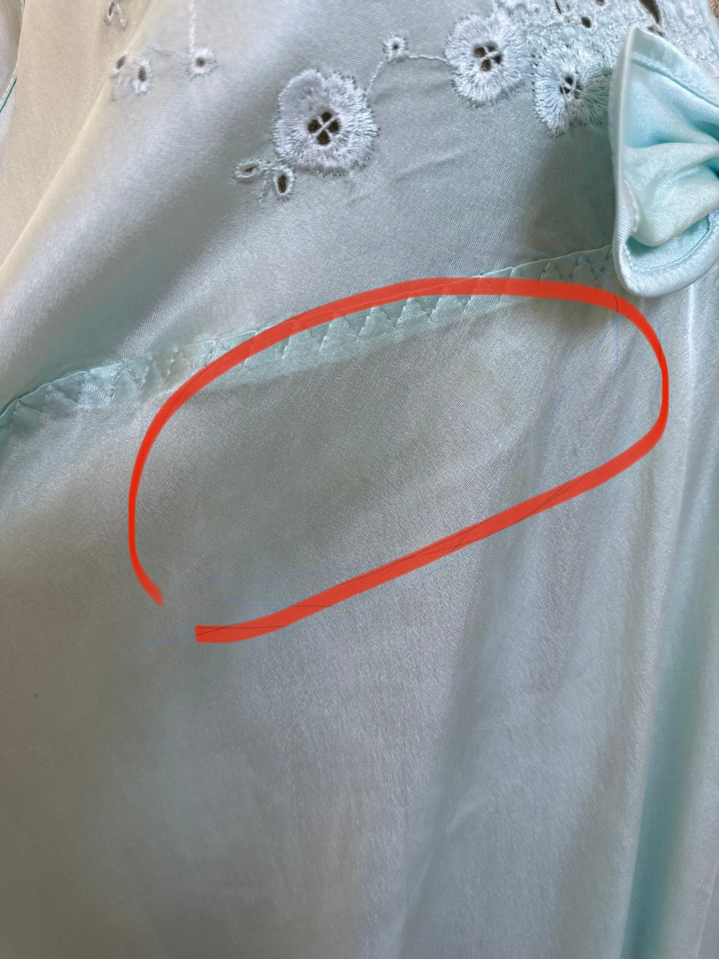 1980s seafoam green long dress with embroidery and plunge neckline