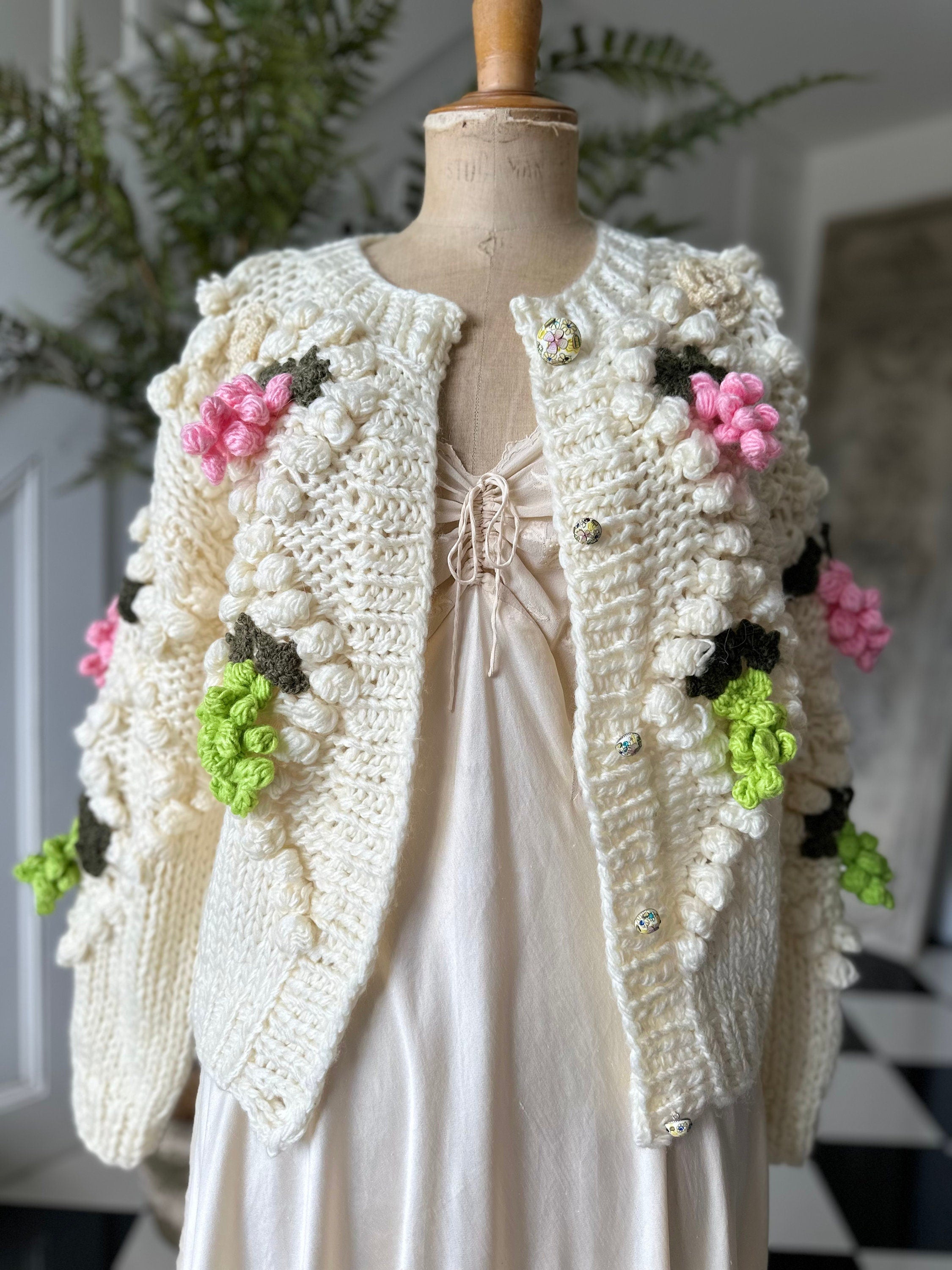 Vintage style hand knitted cream cardigan with grape details