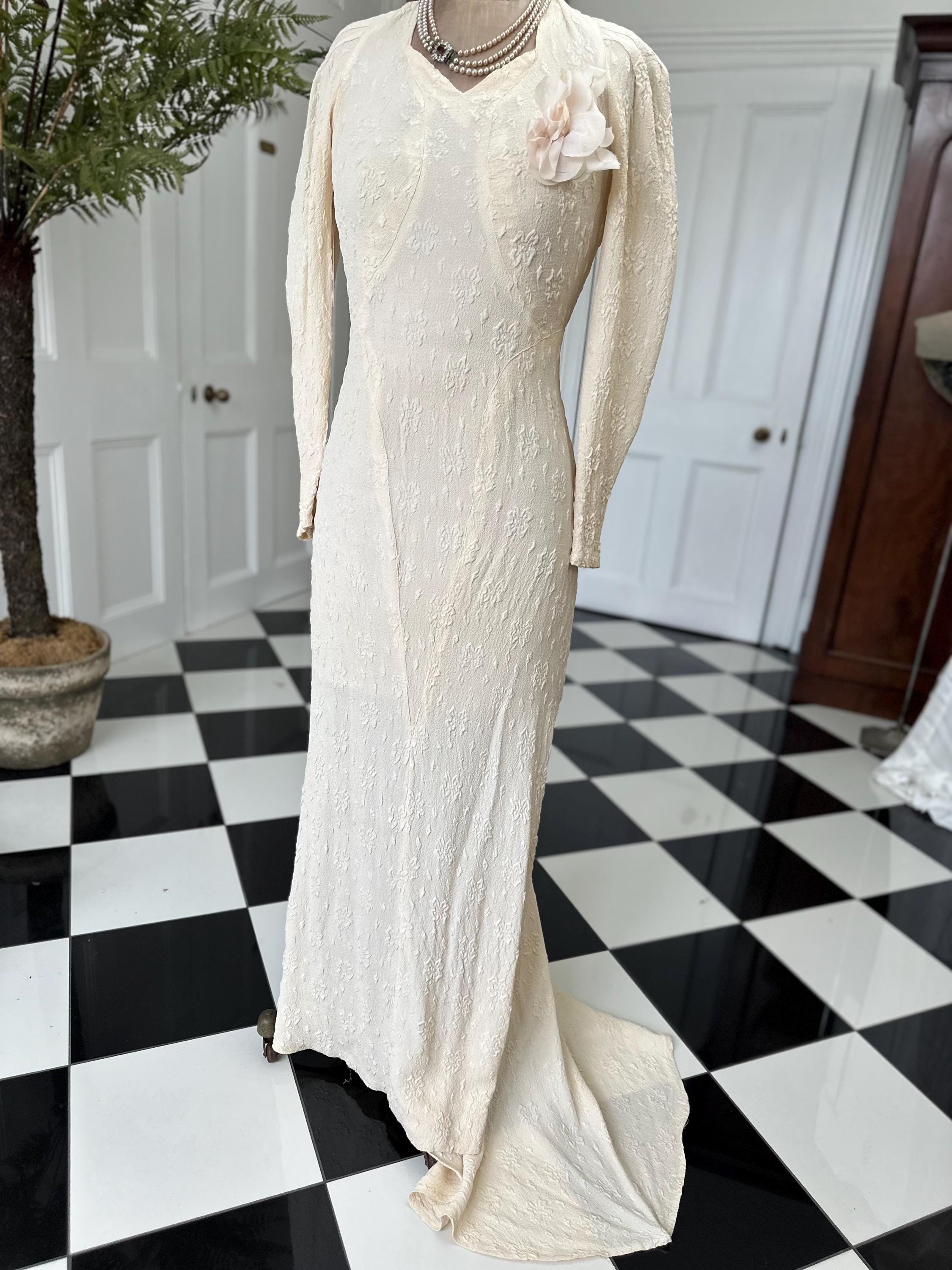 1930s Vintage bias cut wedding dress in peachy cream dress