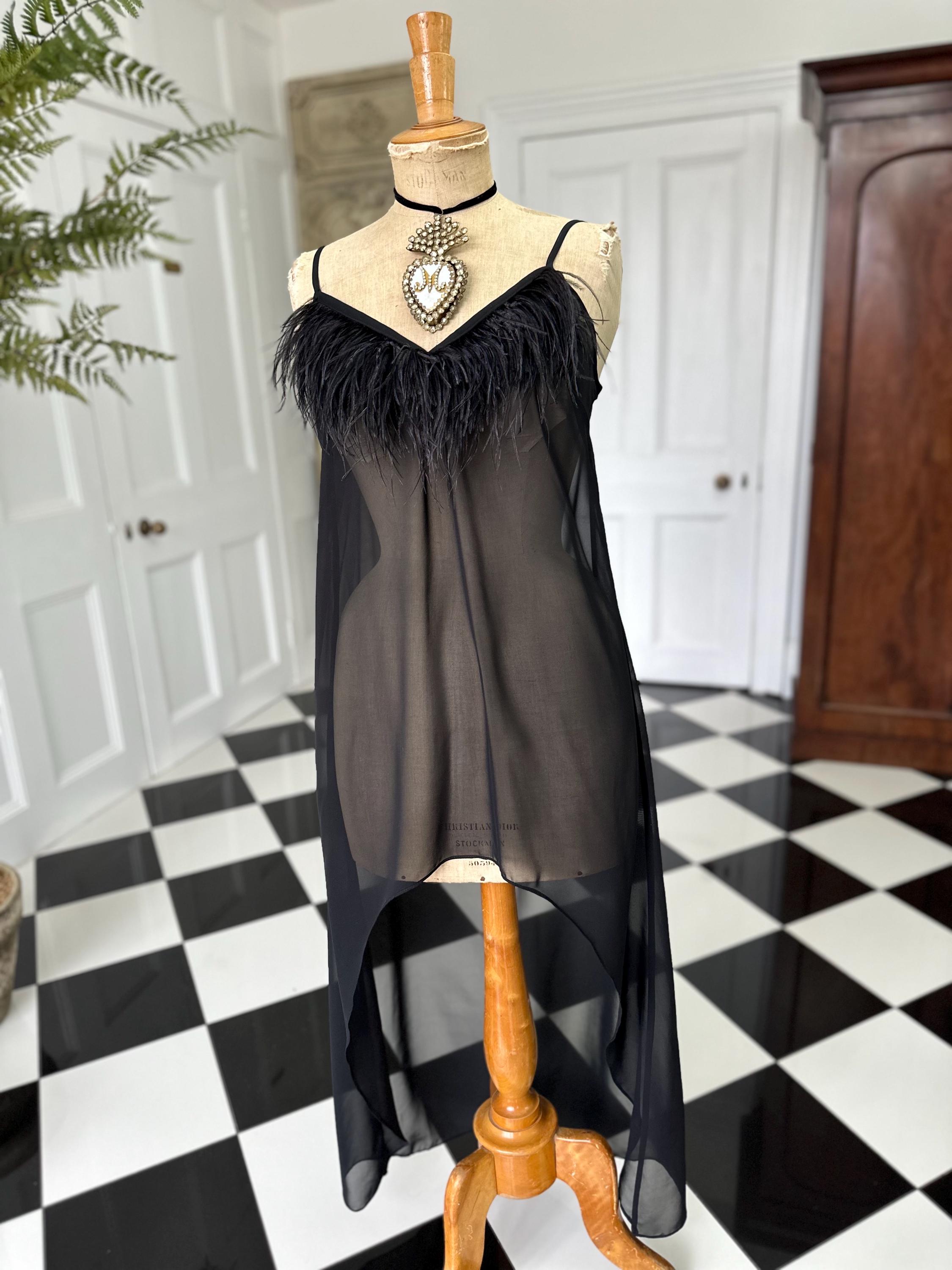 Vintage inspired black sheet chiffon high low slip dress with ostrich feather