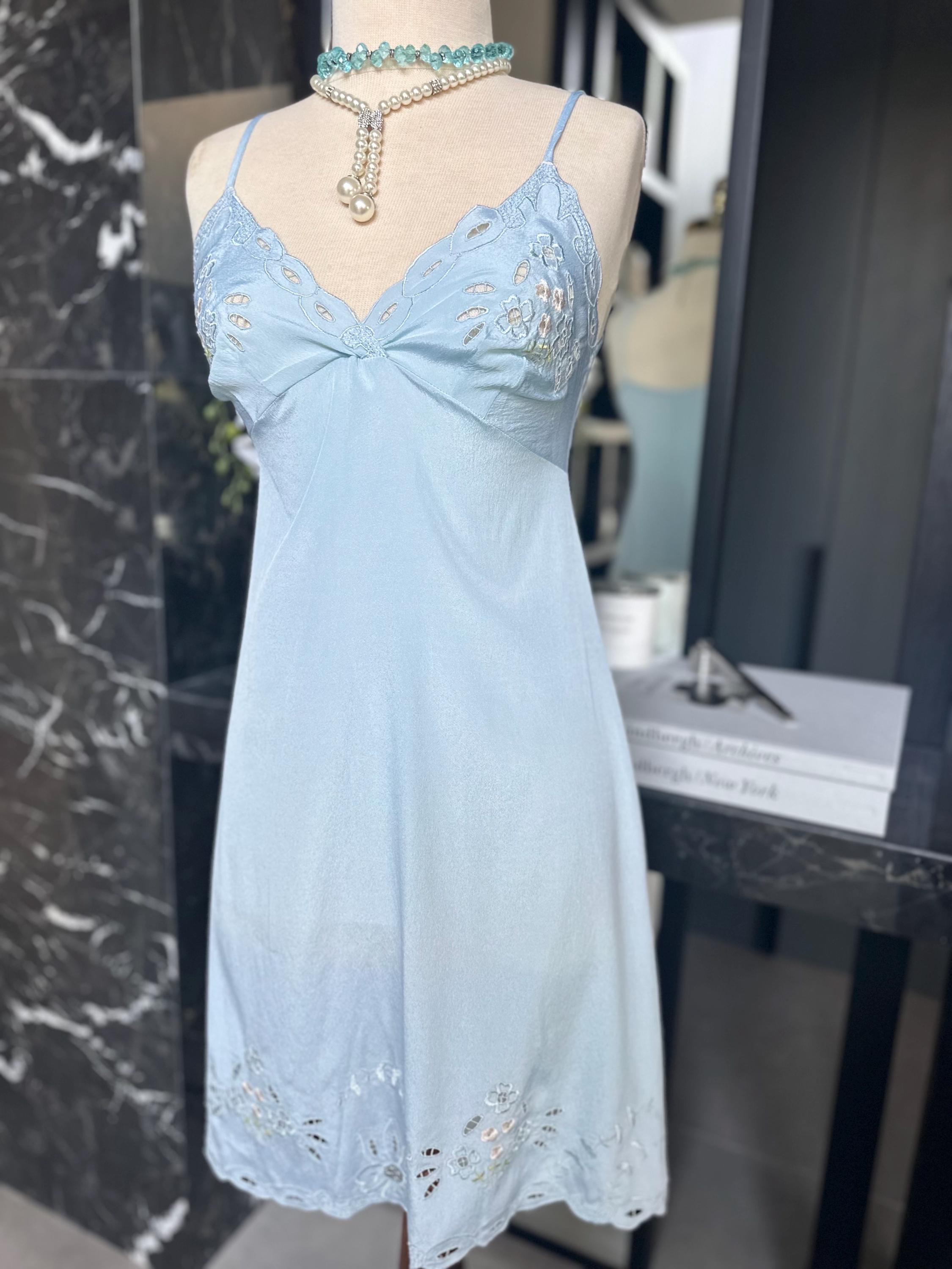 1970s baby blue short satin slip dress with embroidery to the front.