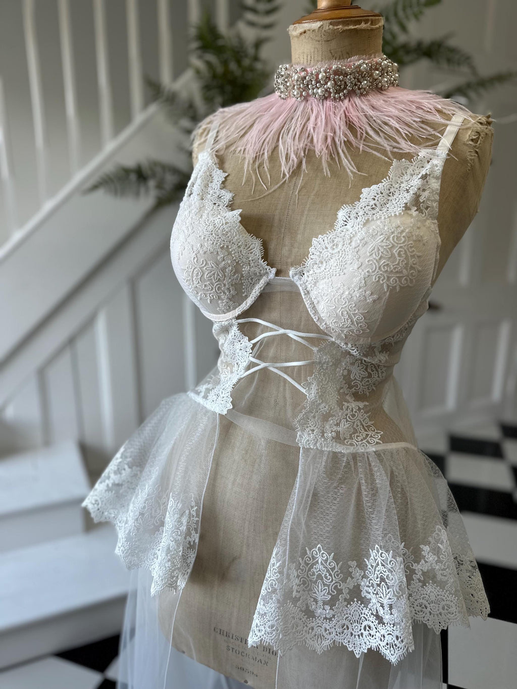 The Seraphina corded lace bridal bustier gown with scolloped peplum and tiered tulle
