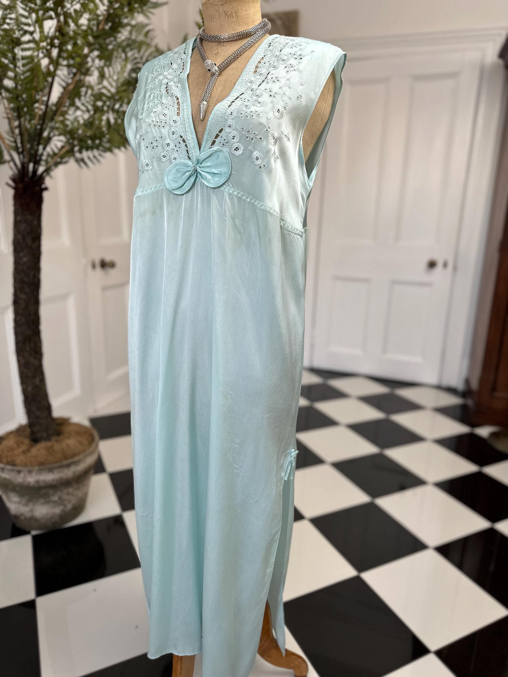 1980s seafoam green long dress with embroidery and plunge neckline