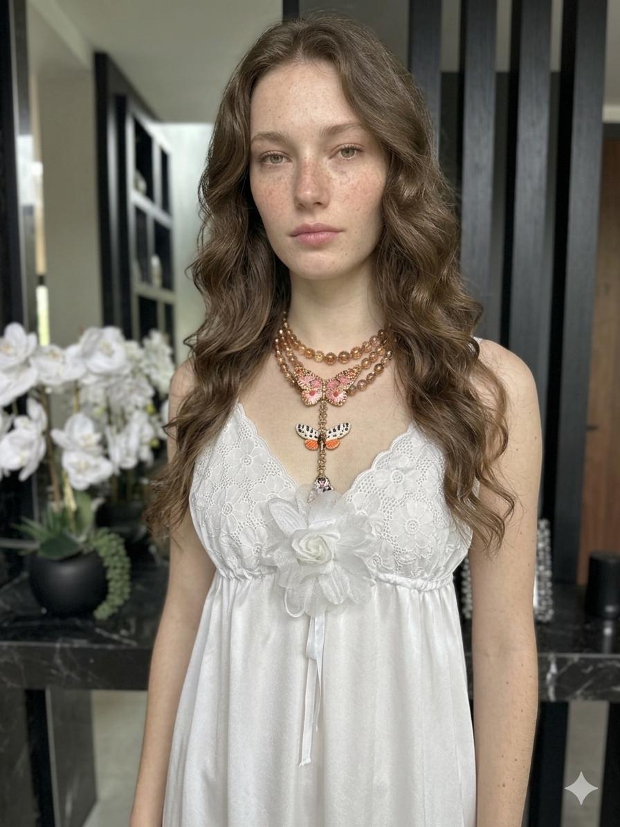 1970s white long satin slip dress with embroidery to the front.