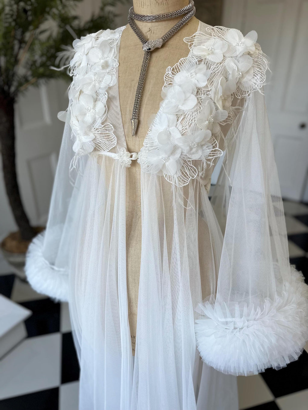 The Aurelia applique 3D floral tulle couture robe with voluminous ruffle sleeves