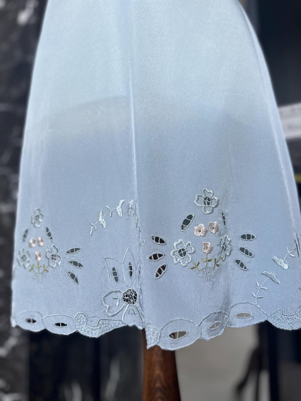 1970s baby blue short satin slip dress with embroidery to the front.