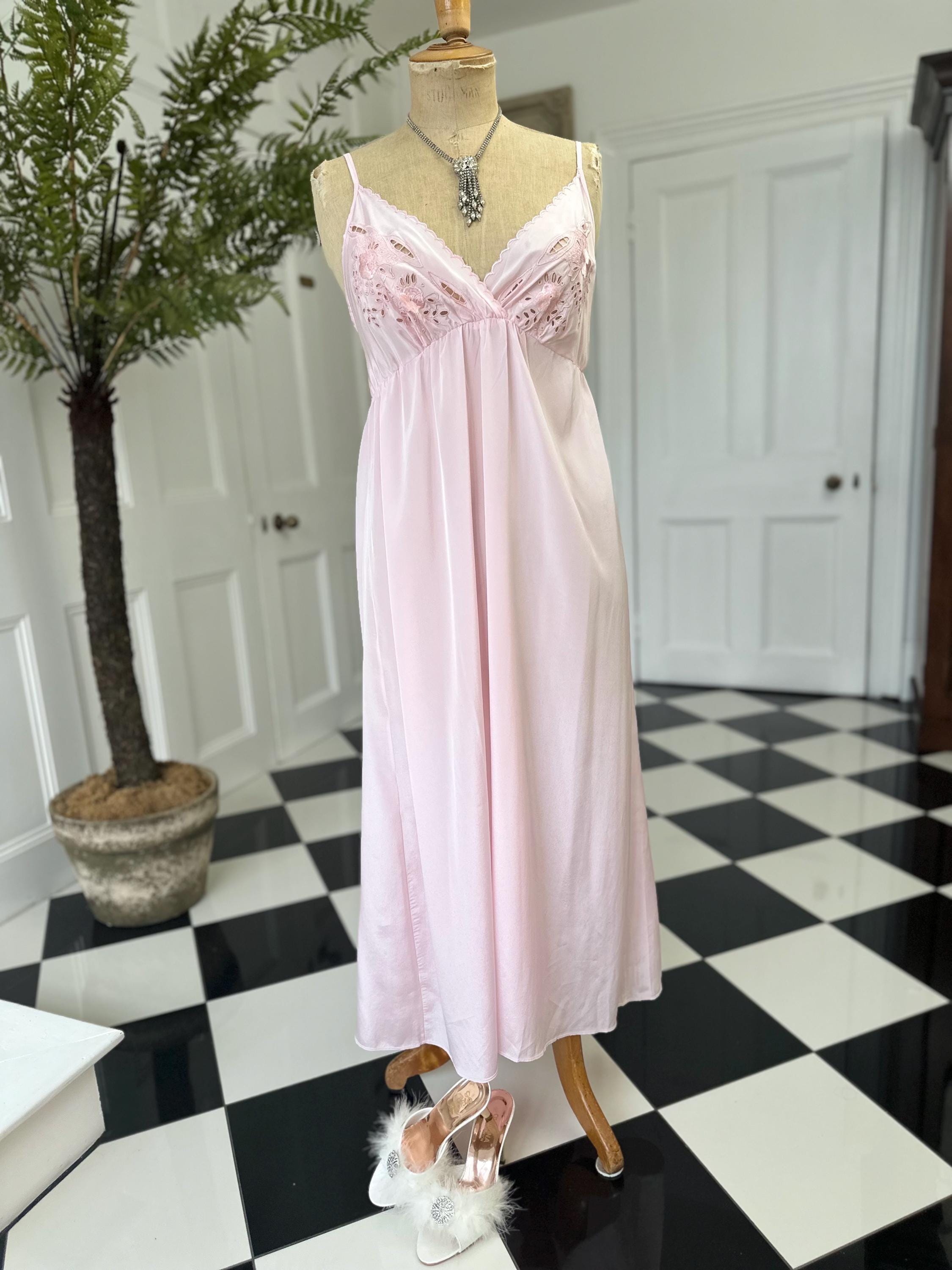 1970s long slip dress in baby pink with embroidery to the front.
