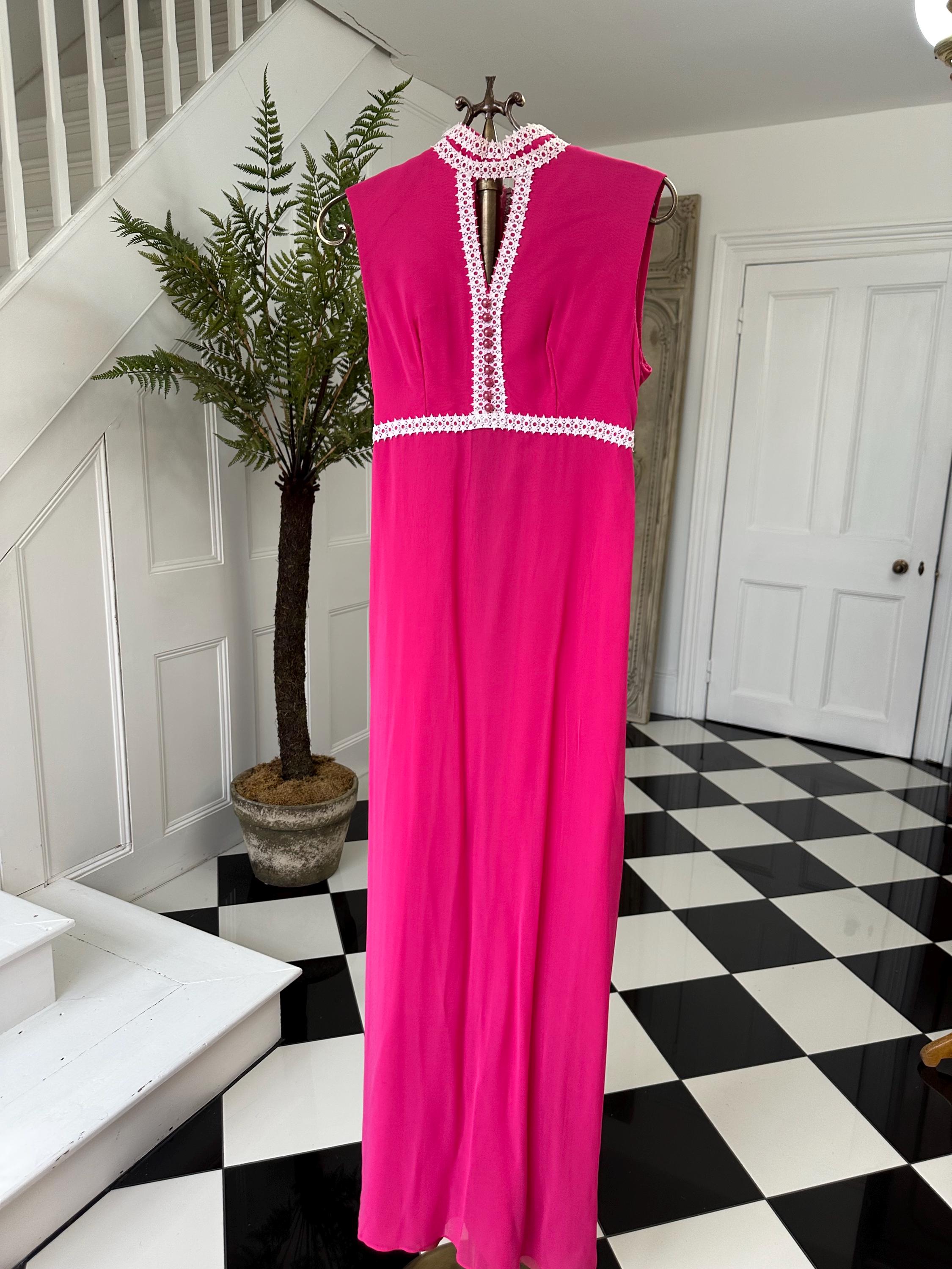 Vintage 1970s Sleeveless hot pink chiffon maxi dress with pearl buttons