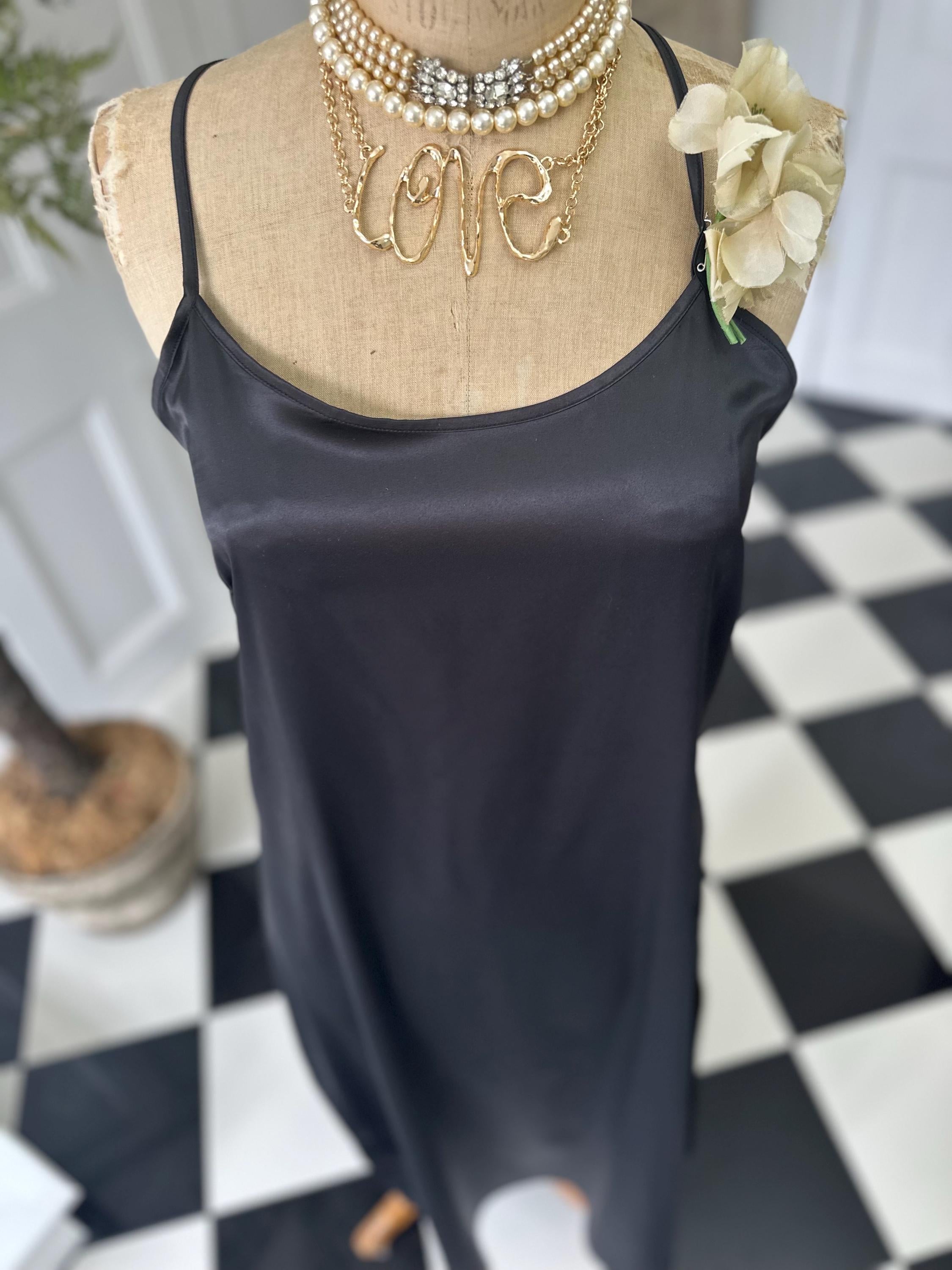 Vintage style long bias cut black slip dress.
