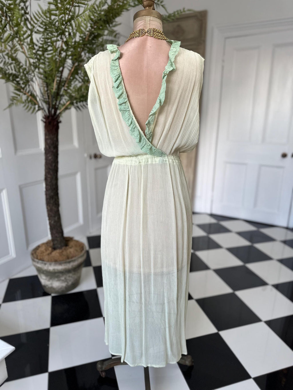 1970s plunge neckline dress in silk crepe  and lace in pale green