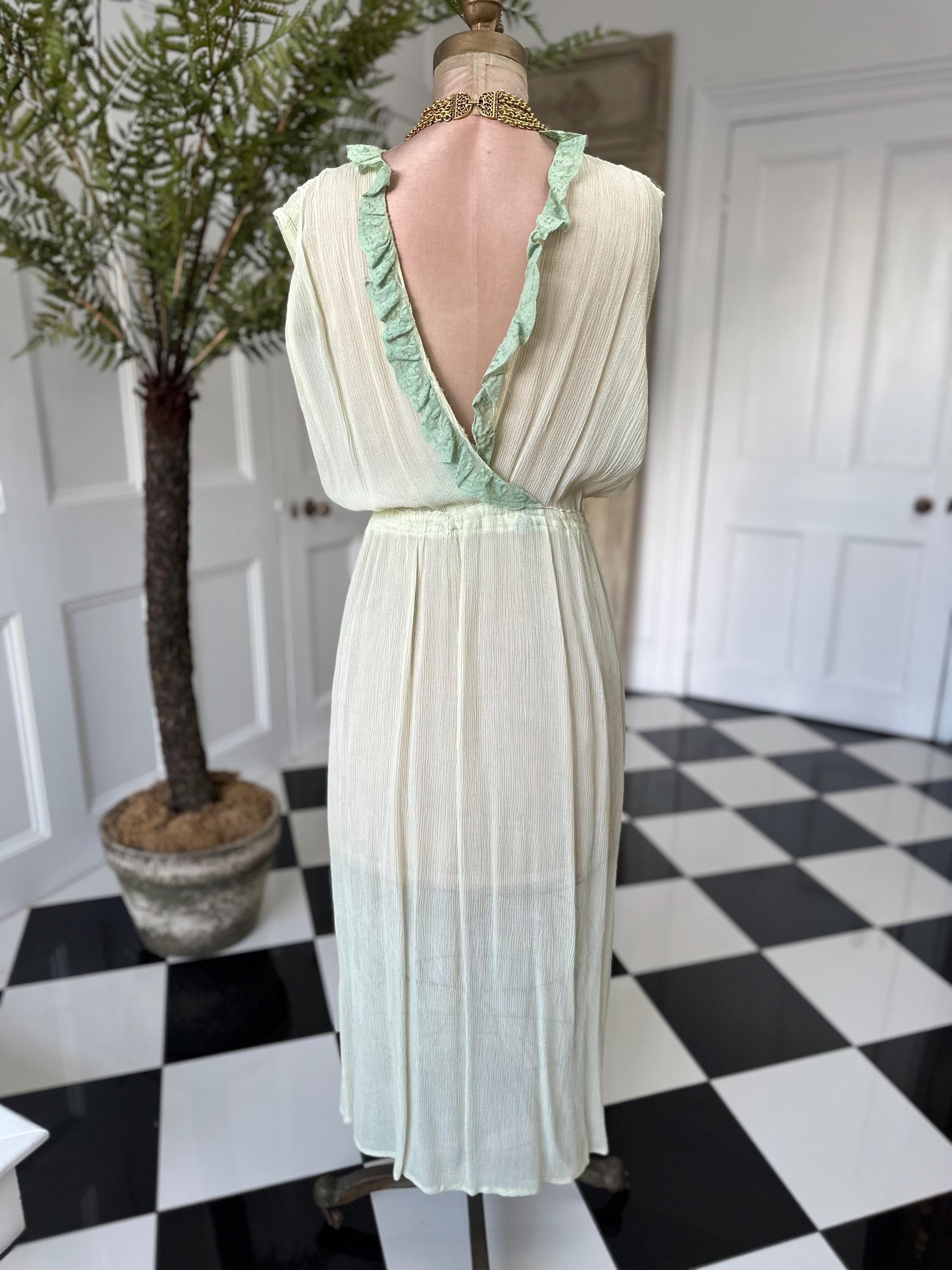 1970s plunge neckline dress in silk crepe  and lace in pale green