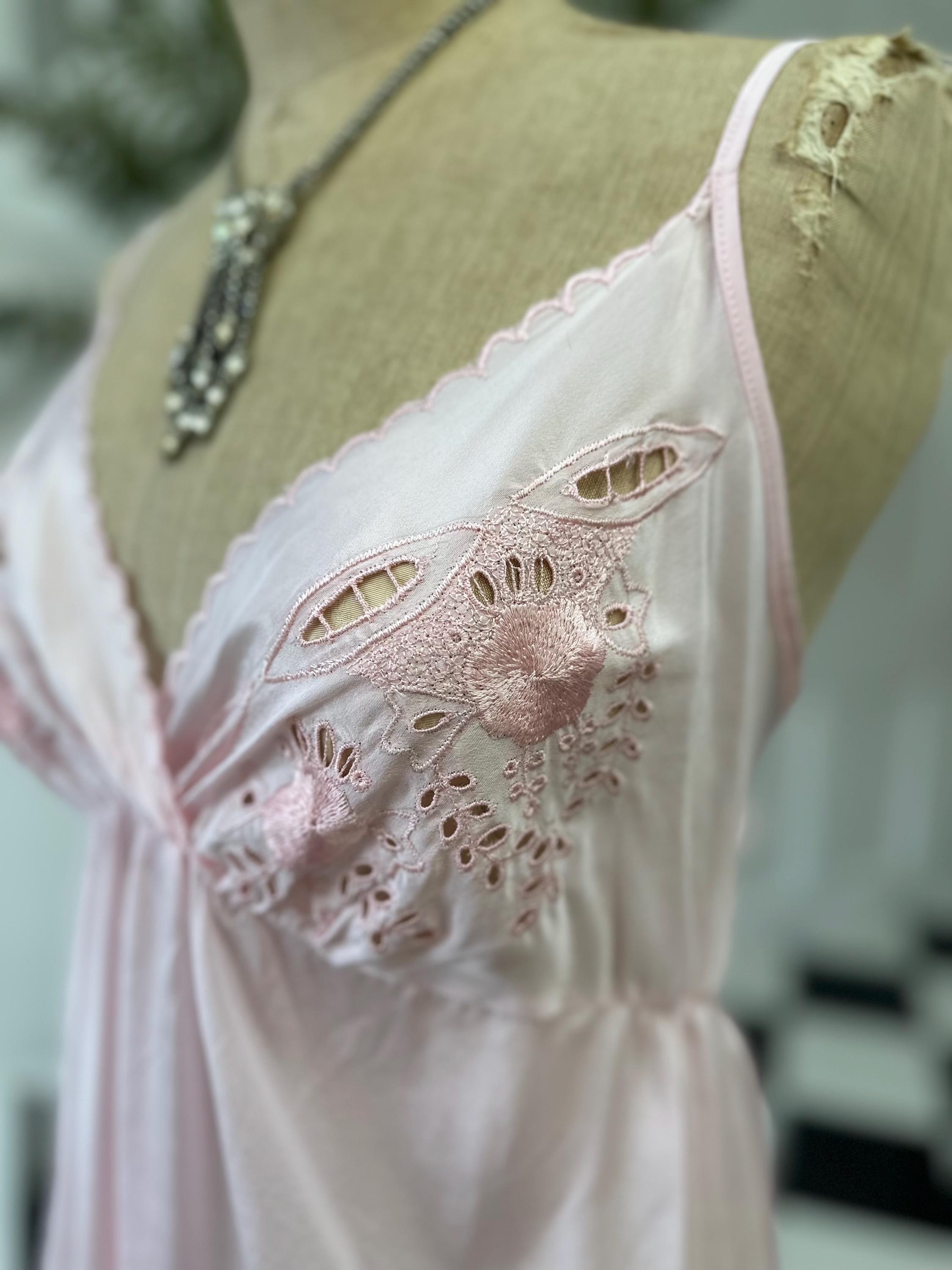 1970s long slip dress in baby pink with embroidery to the front.