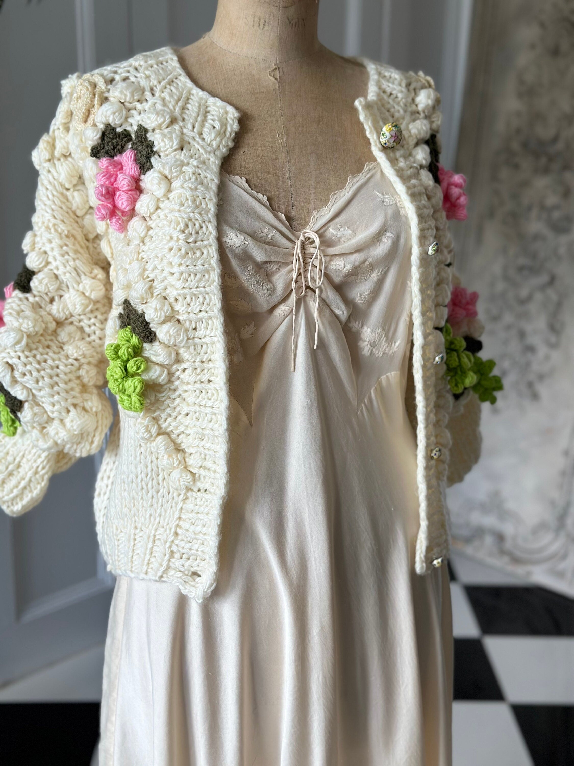 Vintage style hand knitted cream cardigan with grape details