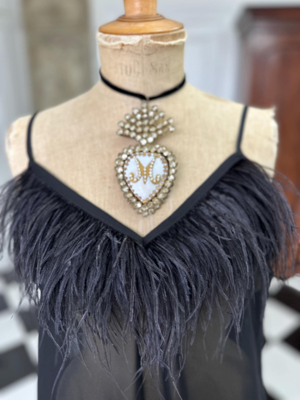 Vintage inspired black sheet chiffon high low slip dress with ostrich feather
