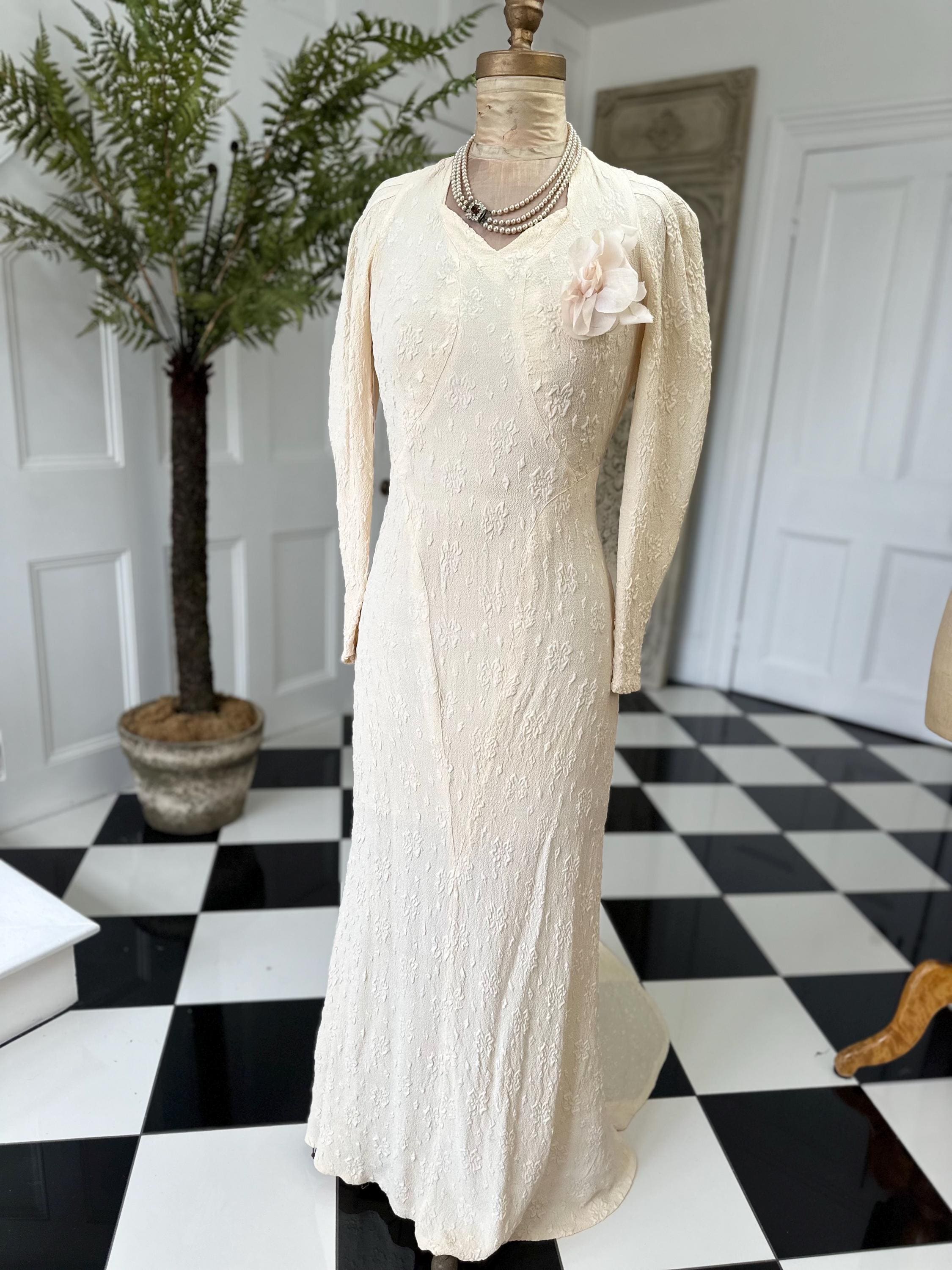 1930s Vintage bias cut wedding dress in peachy cream dress