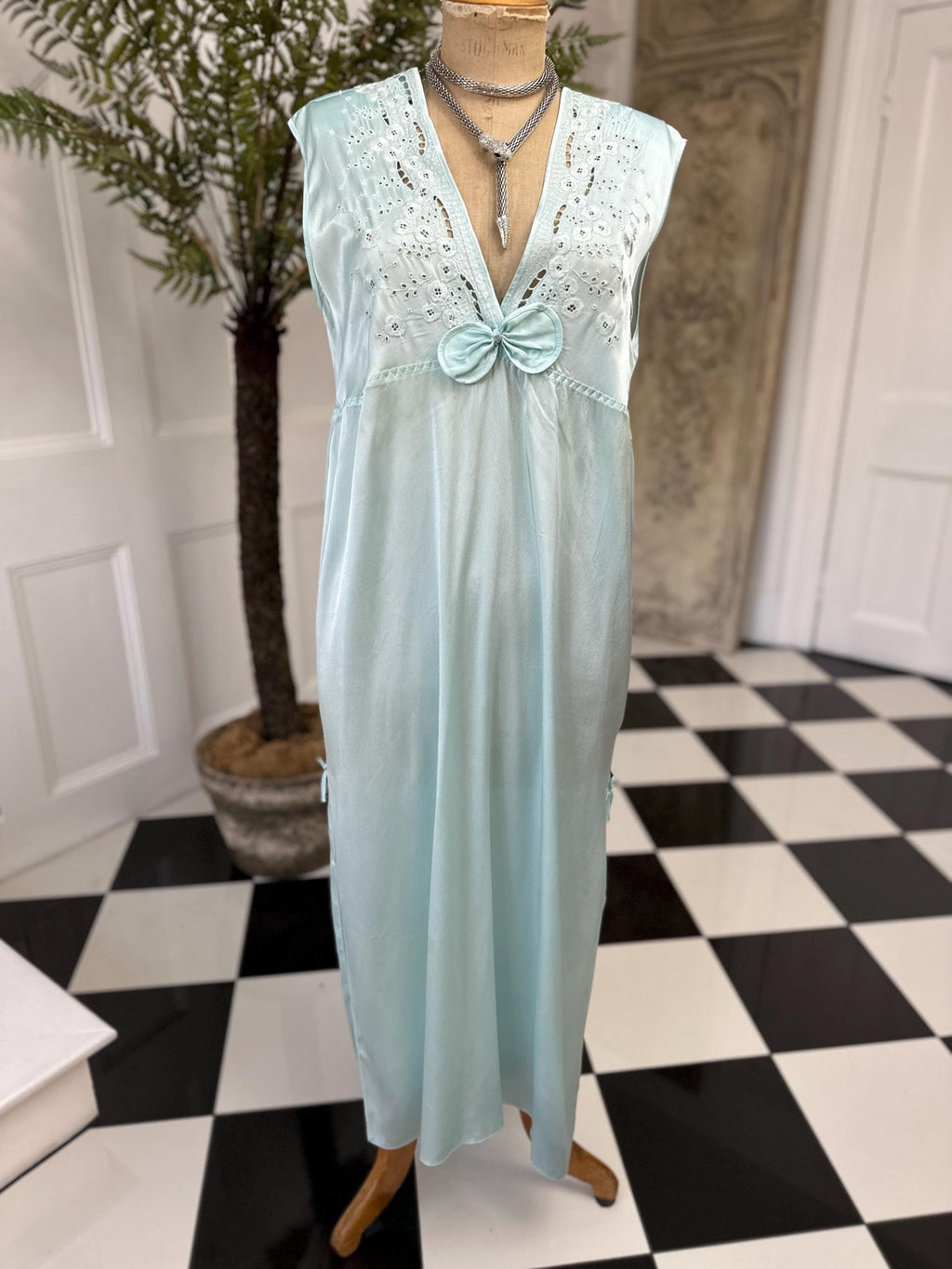 1980s seafoam green long dress with embroidery and plunge neckline