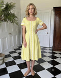 Vintage 1950s pretty summer dress in pale yellow dress