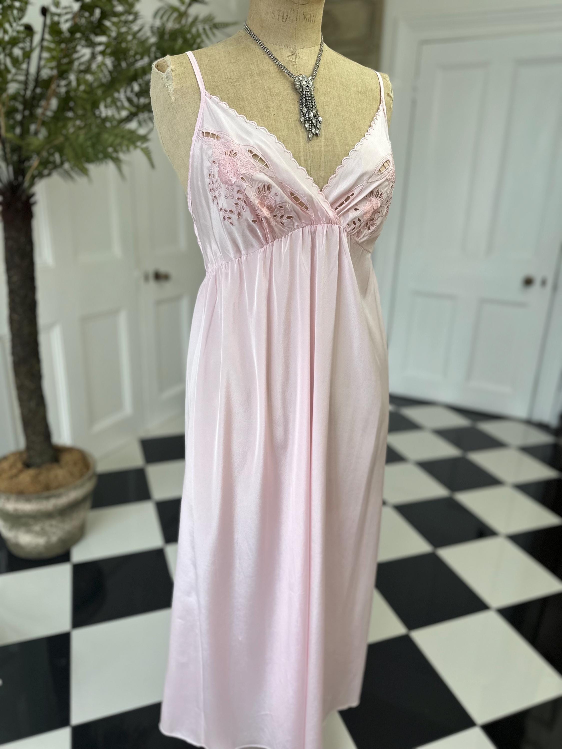 1970s long slip dress in baby pink with embroidery to the front.