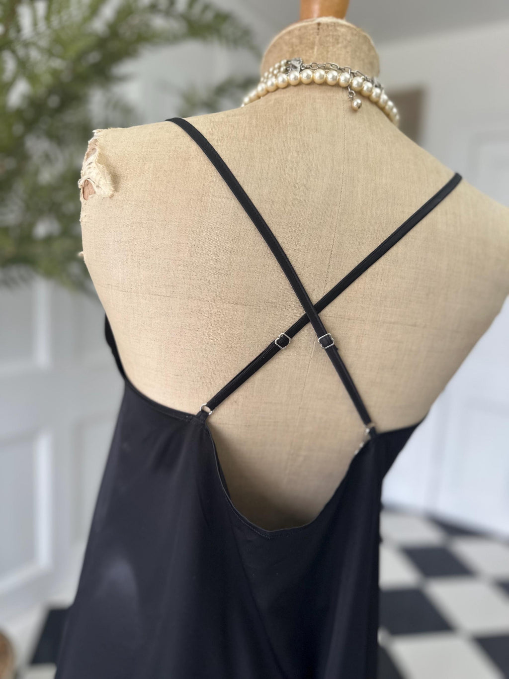 Vintage style long bias cut black slip dress.