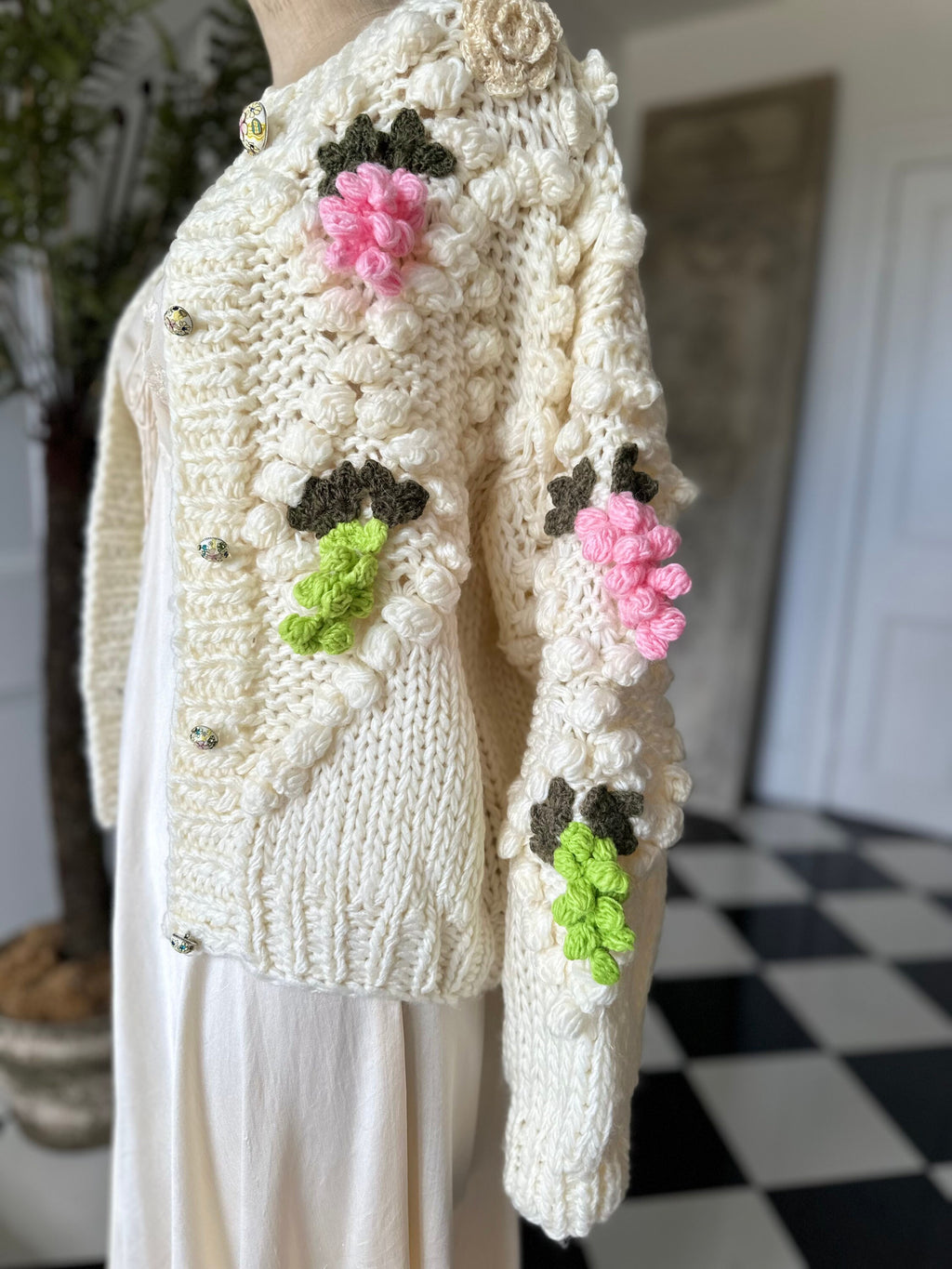 Vintage style hand knitted cream cardigan with grape details