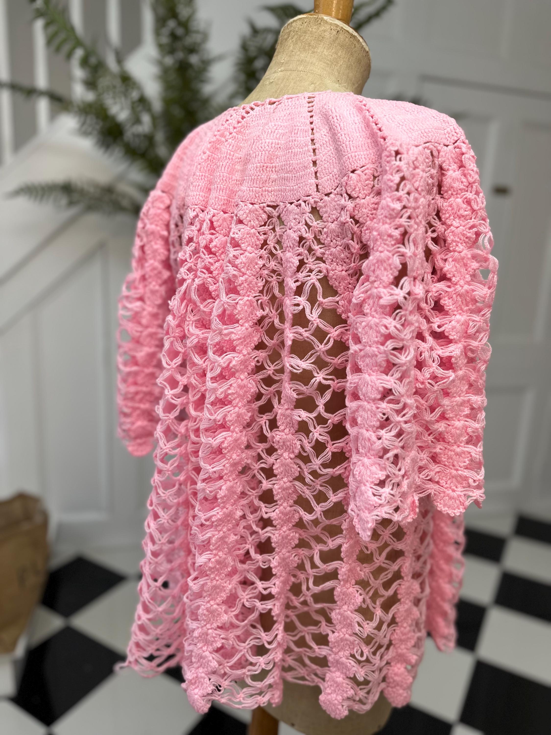 Vintage 1970s pink hand knitted cardigan