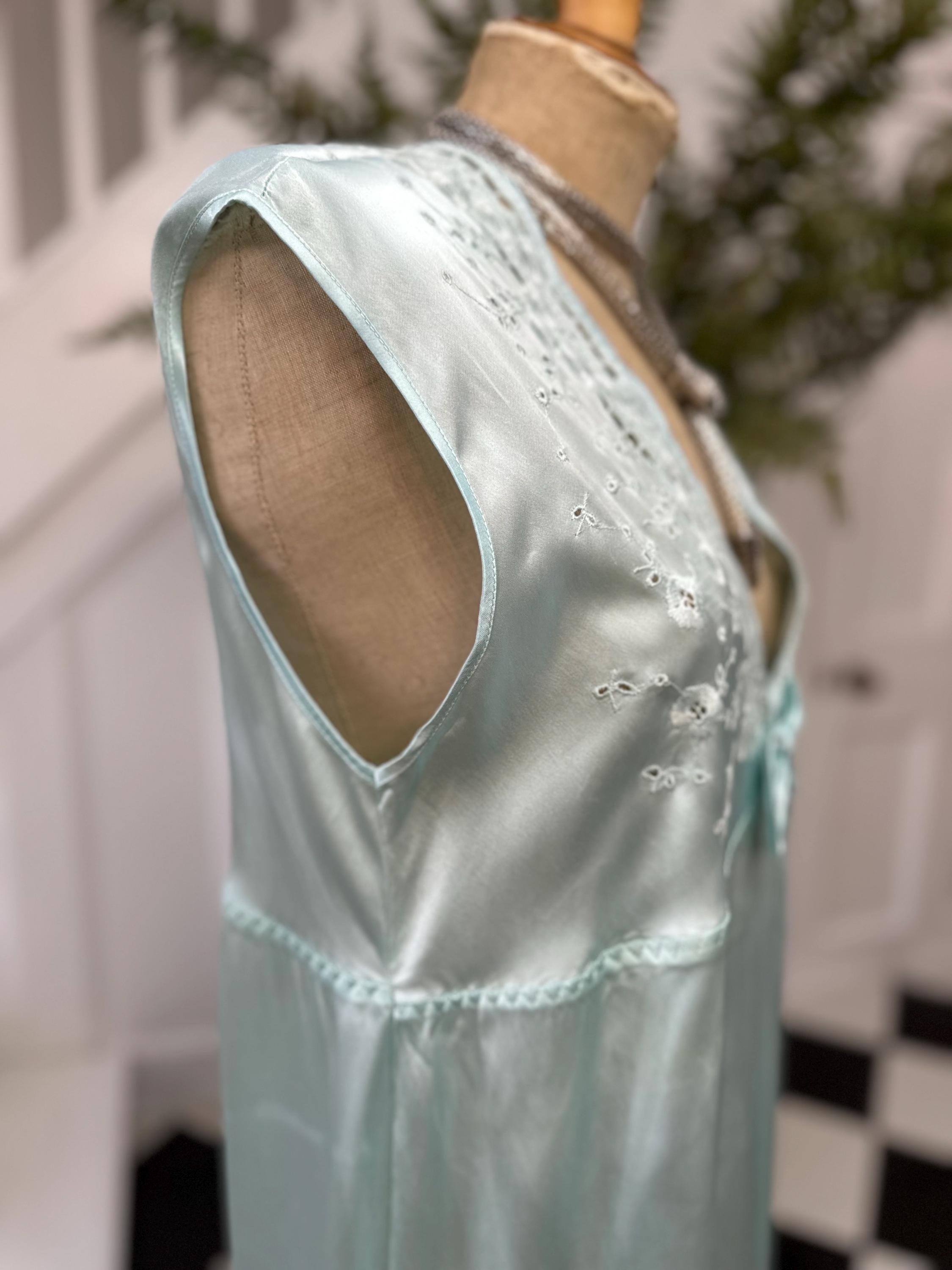 1980s seafoam green long dress with embroidery and plunge neckline