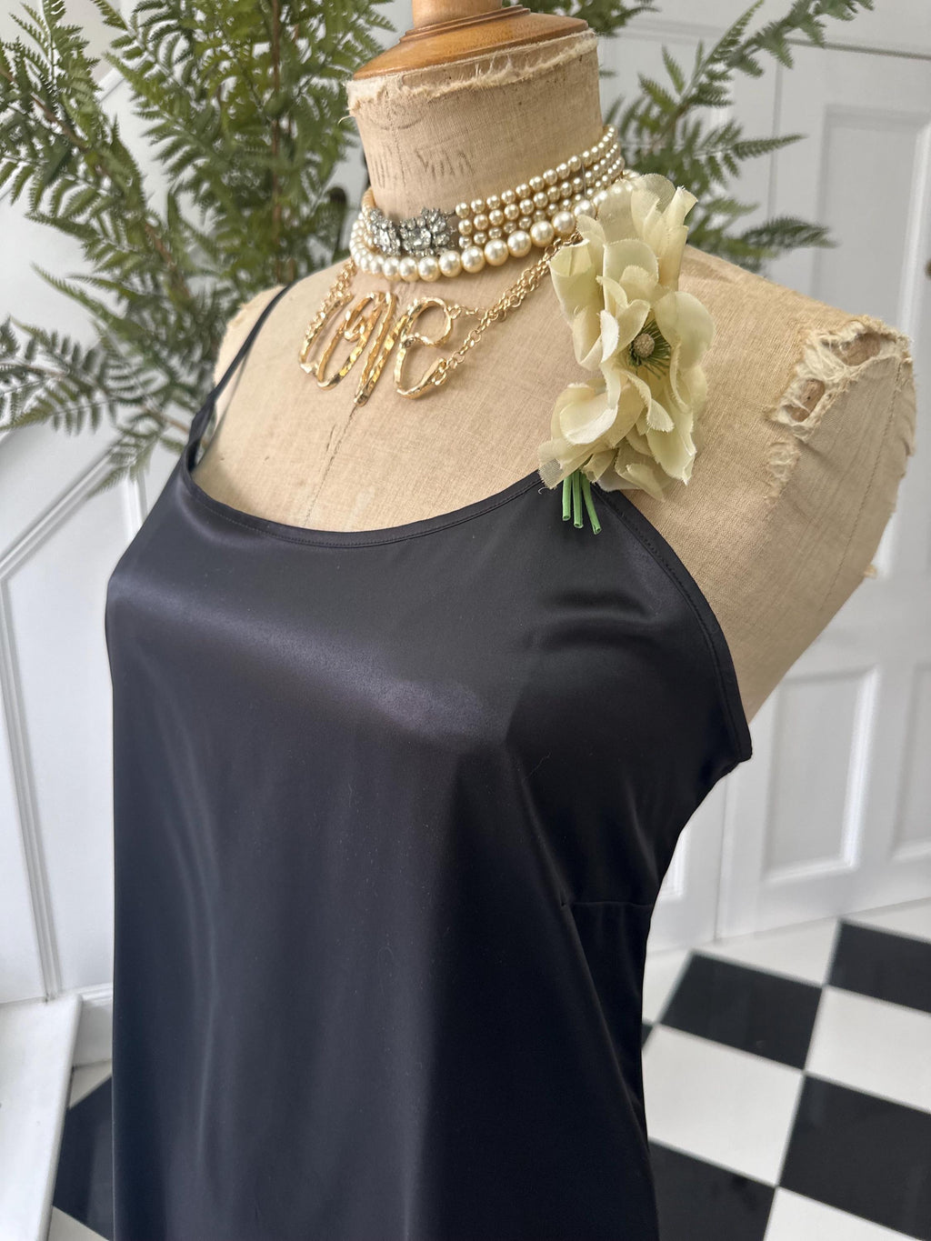 Vintage style long bias cut black slip dress.