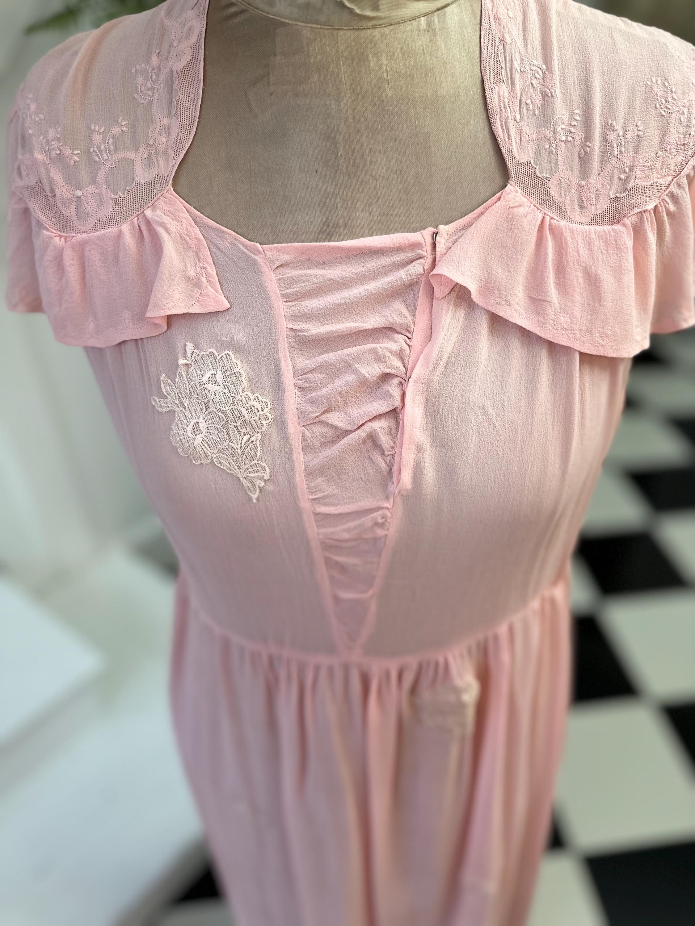 1940s Pink silk crepe dress with hand embroidery details on the shoulder added lace appliqués