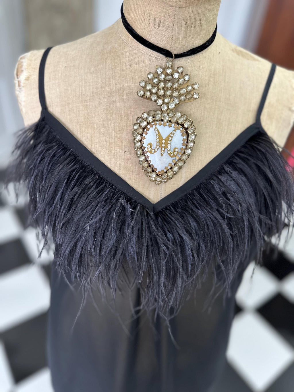 Vintage inspired black sheet chiffon high low slip dress with ostrich feather