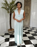1980s seafoam green long dress with embroidery and plunge neckline