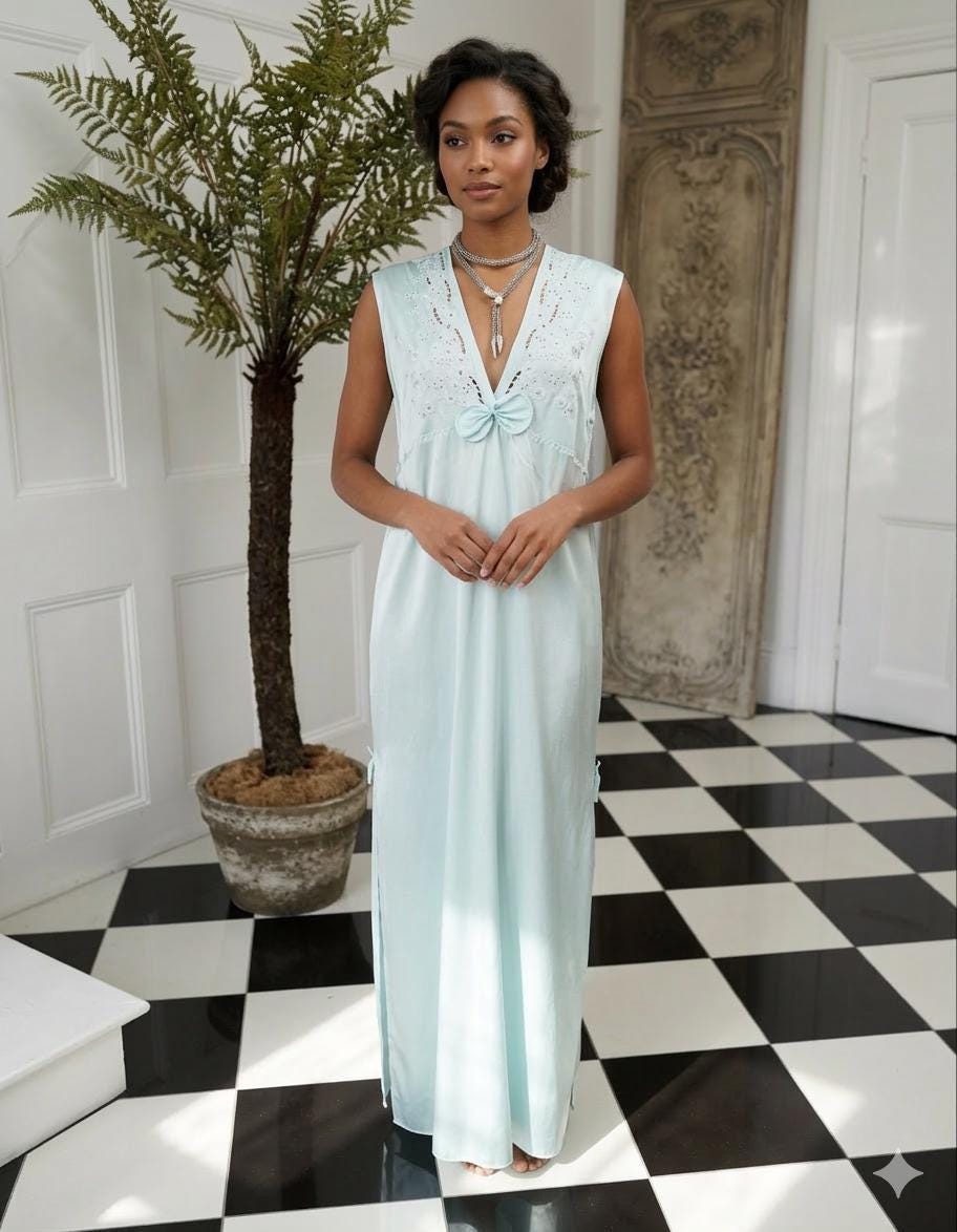 1980s seafoam green long dress with embroidery and plunge neckline