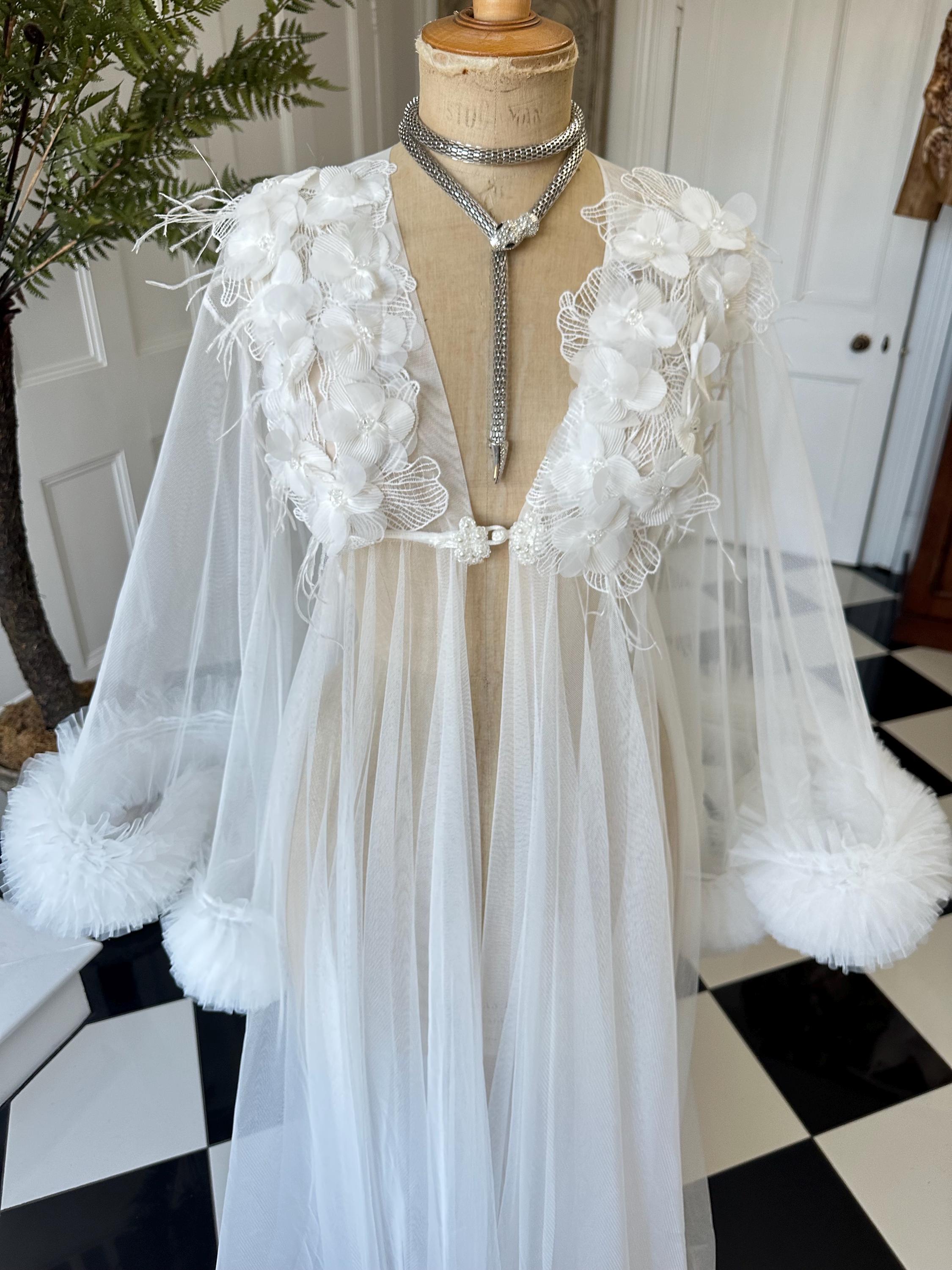The Aurelia applique 3D floral tulle couture robe with voluminous ruffle sleeves