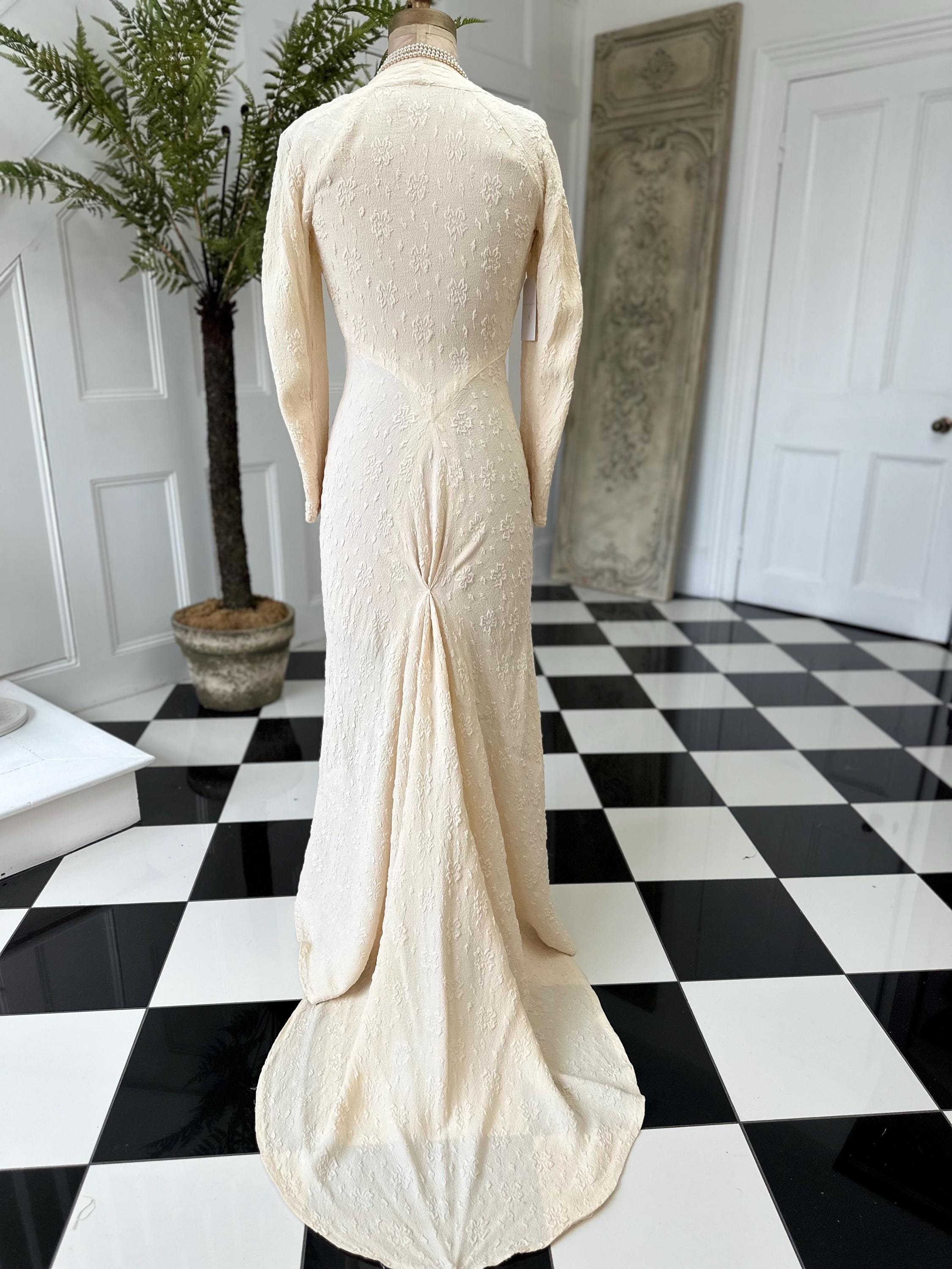 1930s Vintage bias cut wedding dress in peachy cream dress