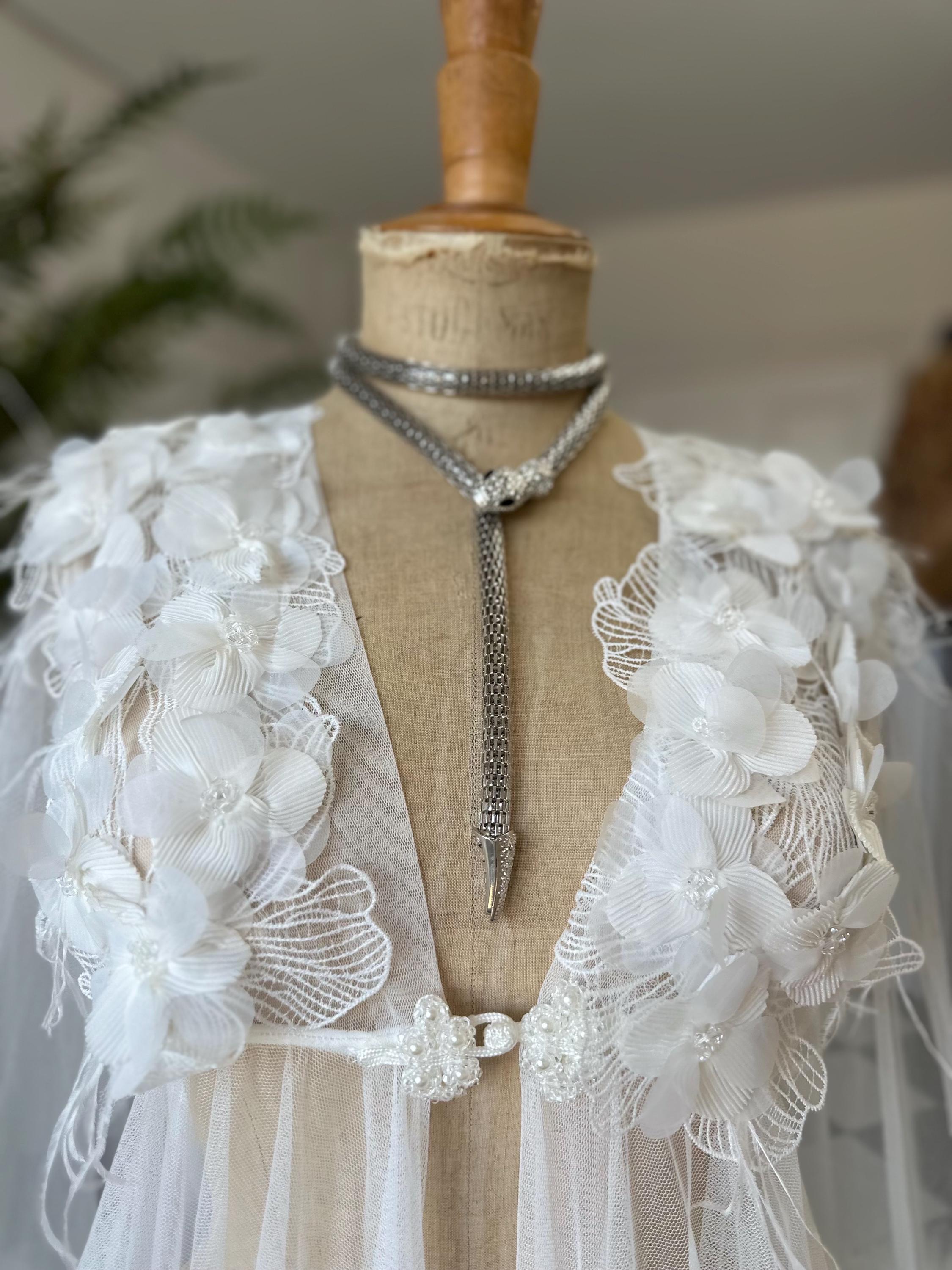 The Aurelia applique 3D floral tulle couture robe with voluminous ruffle sleeves