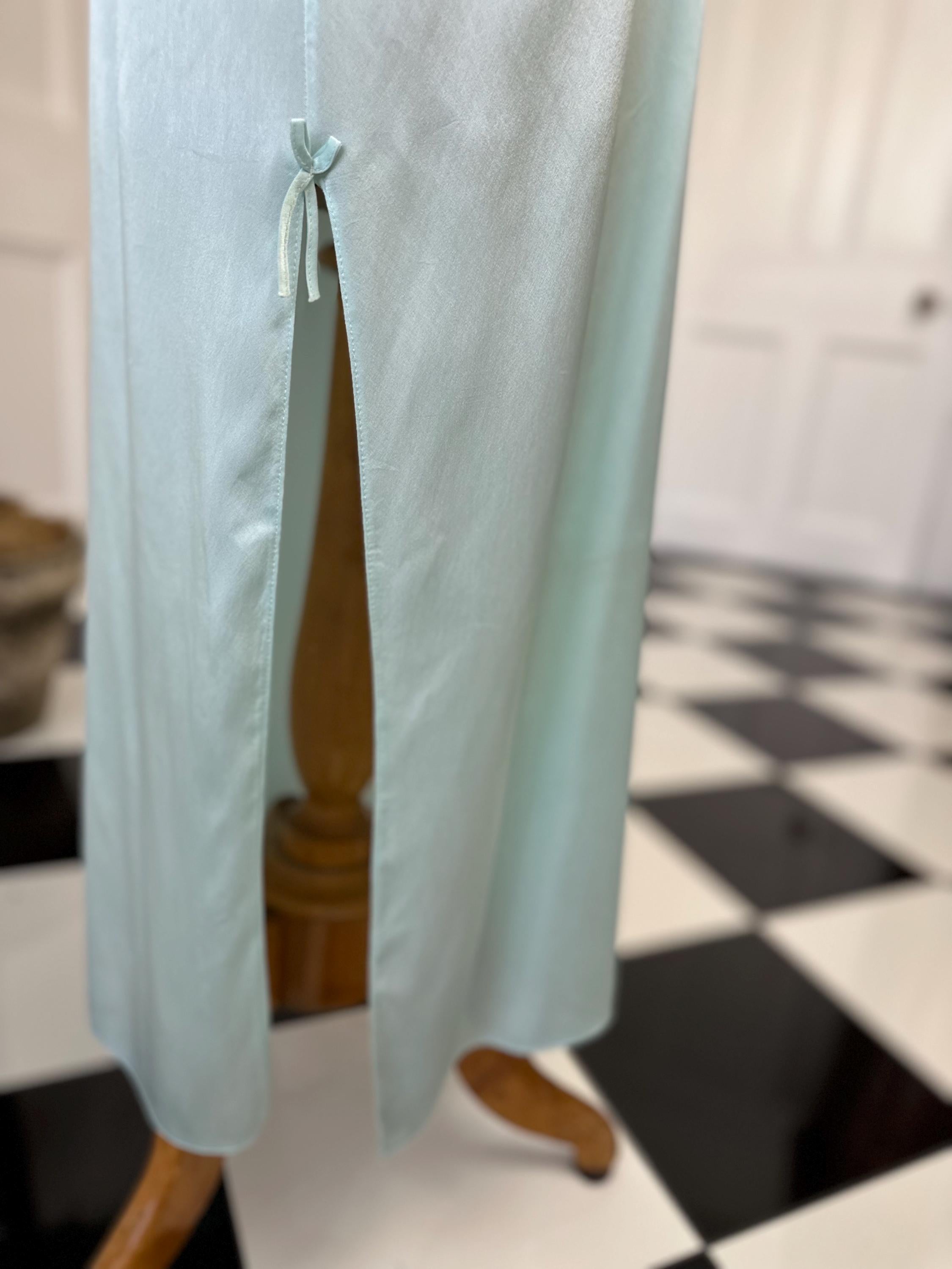 1980s seafoam green long dress with embroidery and plunge neckline