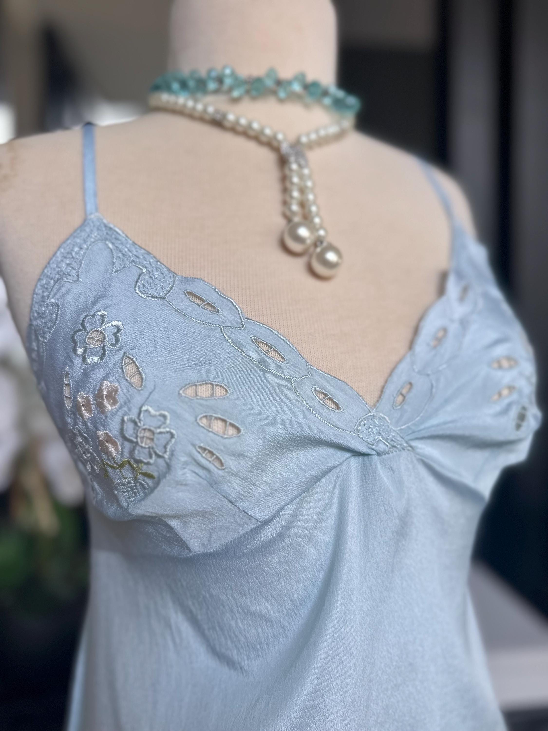 1970s baby blue short satin slip dress with embroidery to the front.