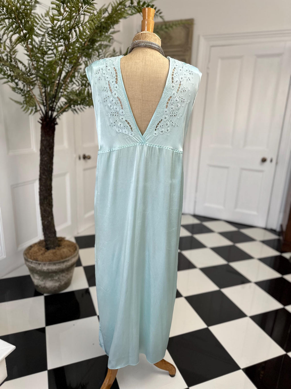 1980s seafoam green long dress with embroidery and plunge neckline