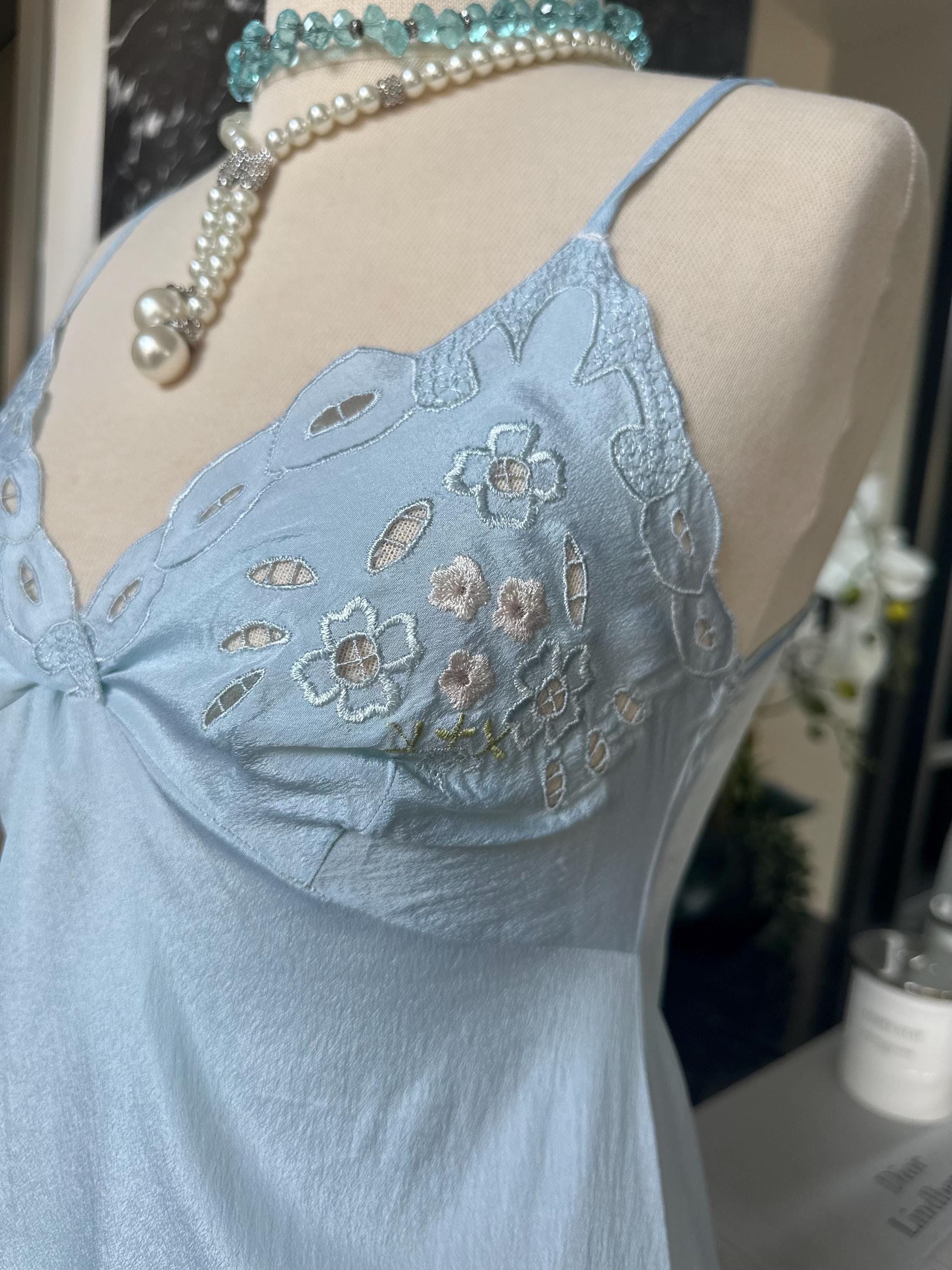 1970s baby blue short satin slip dress with embroidery to the front.