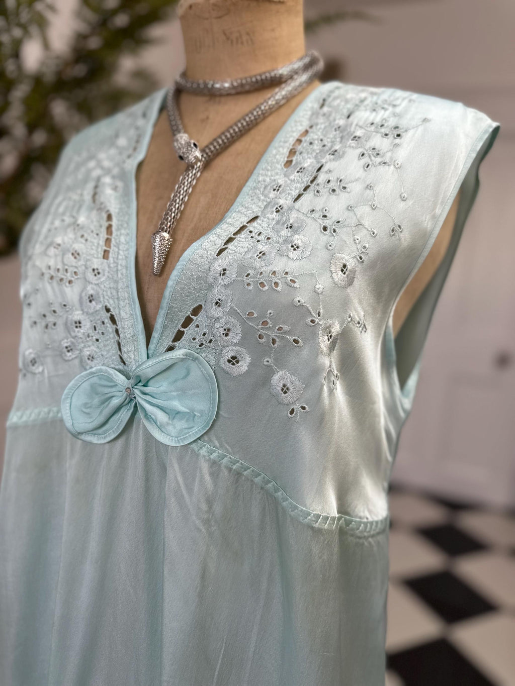 1980s seafoam green long dress with embroidery and plunge neckline