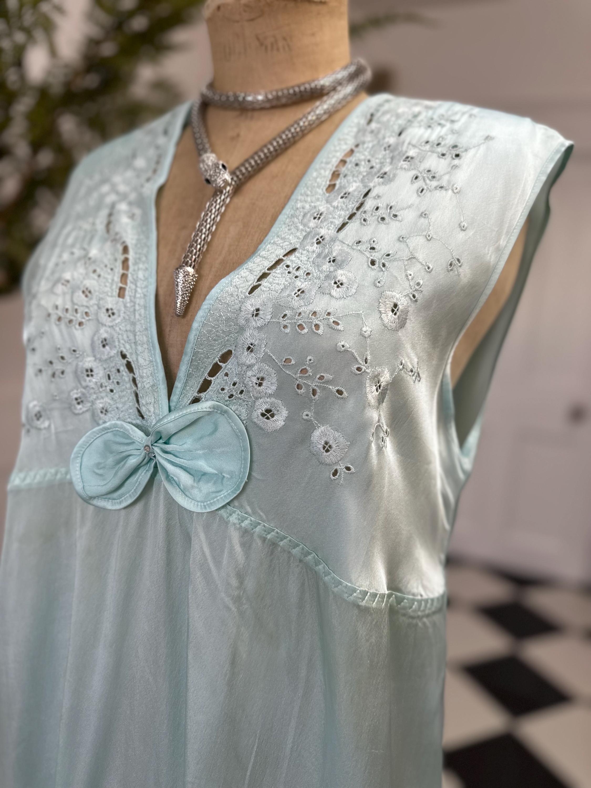 1980s seafoam green long dress with embroidery and plunge neckline